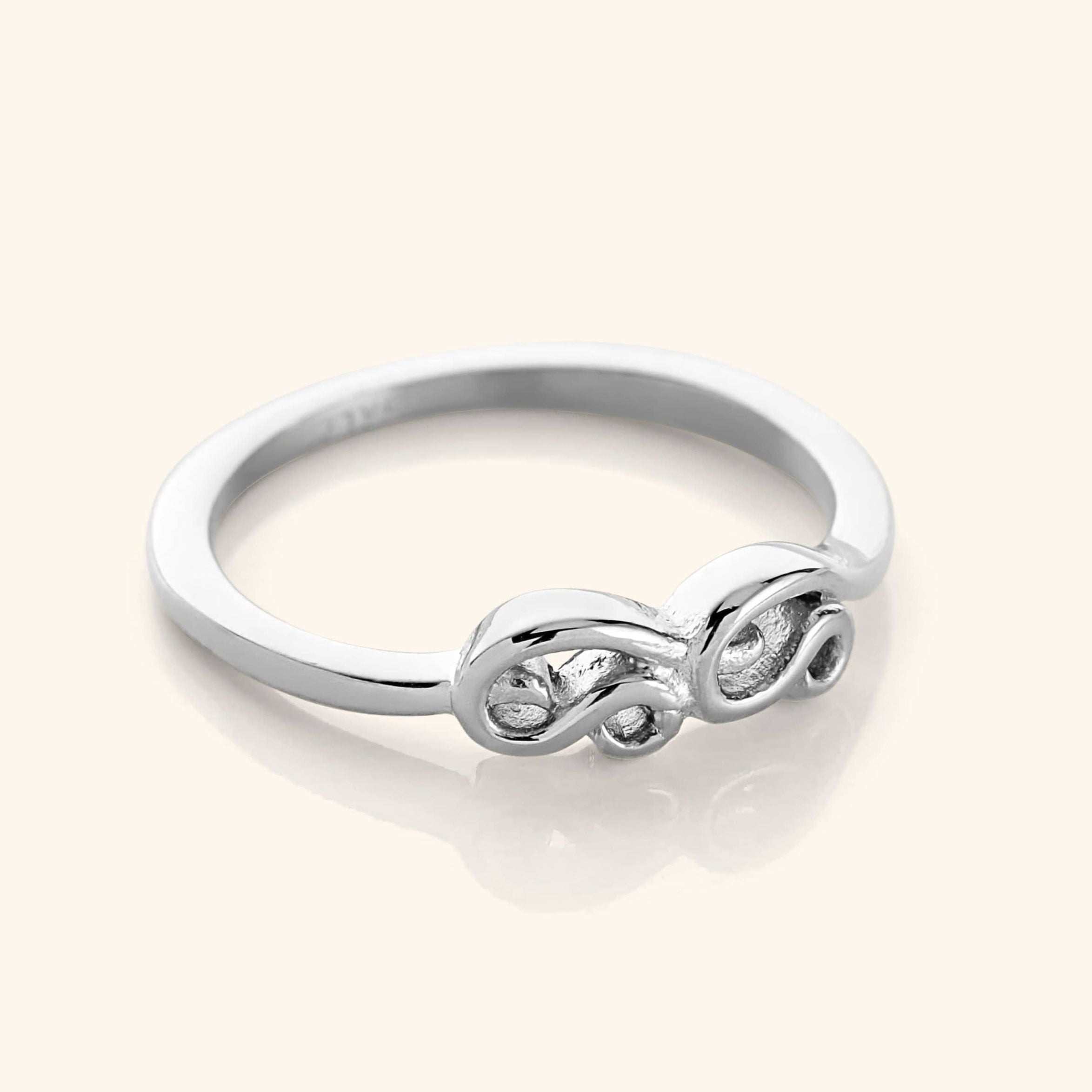Close-up of the mama ring emphasizing the gold plating and craftsmanship.