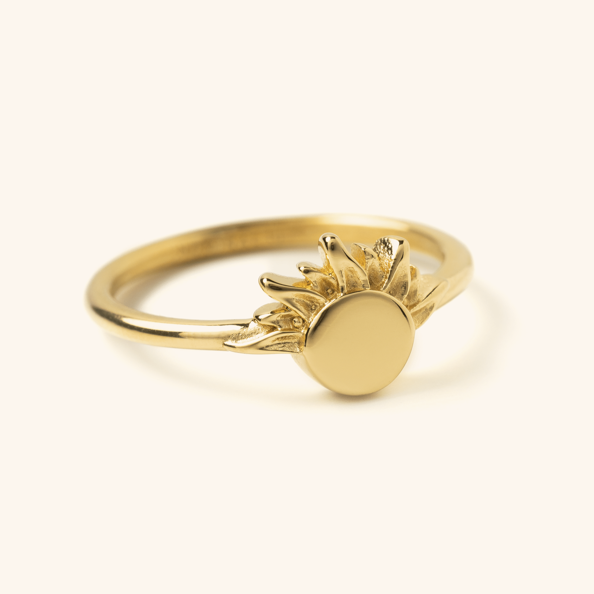 Radiant Sun Ring displayed in a velvet pouch, highlighting its minimalist design.