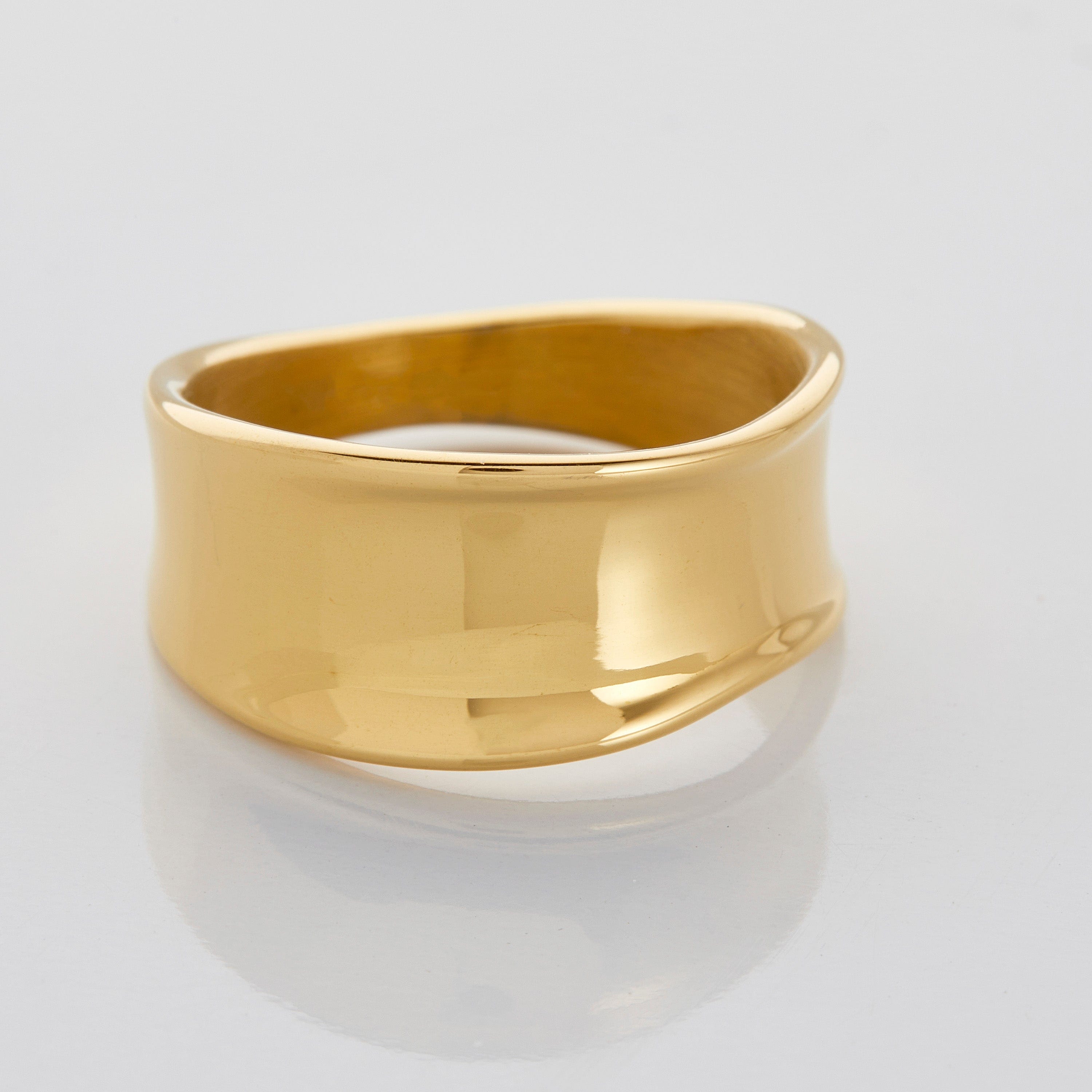 Melted Elegance Chunky Ring showcasing the unique flow and tall band from a side angle.
