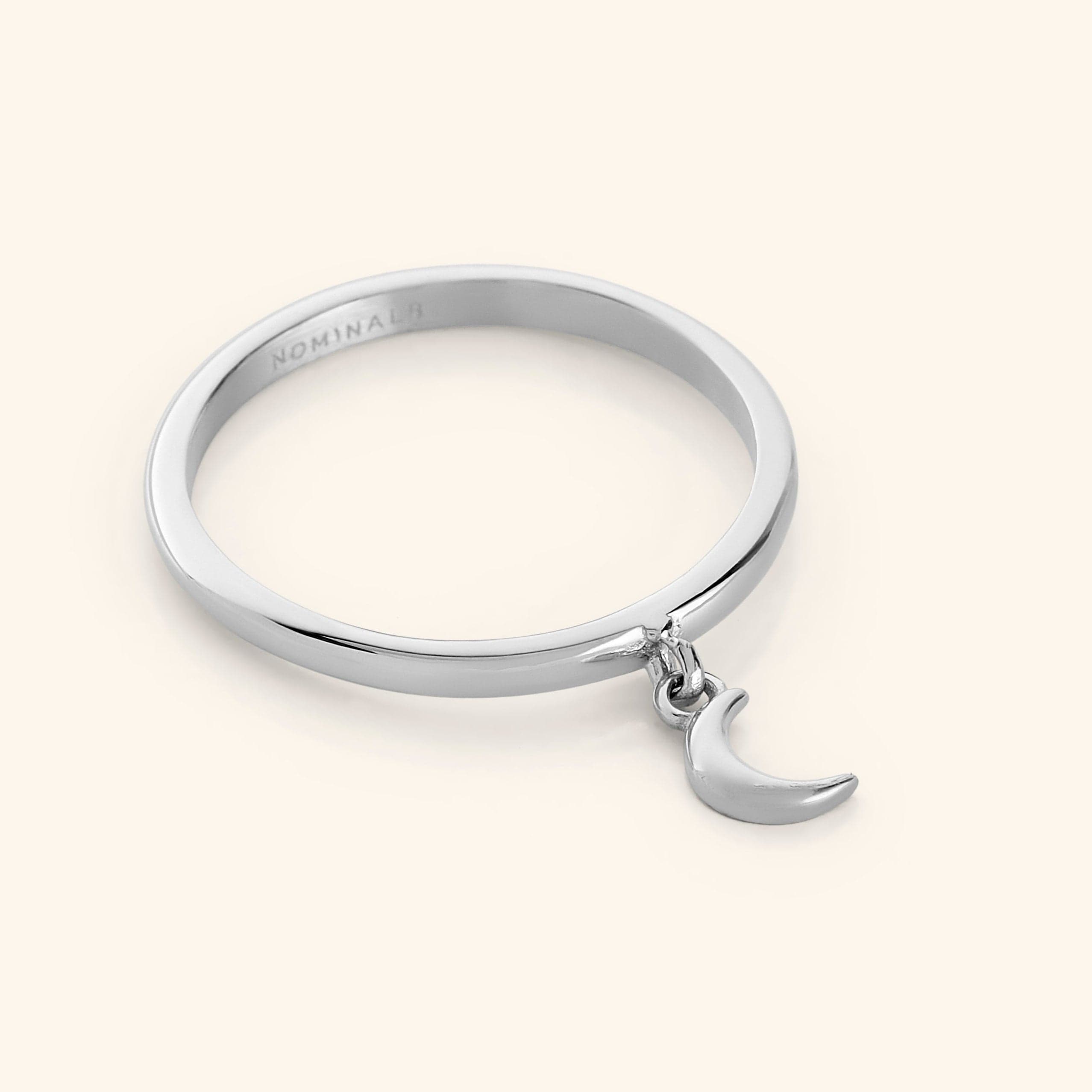 Lifestyle shot of gold ring on womans hand, showcasing affordable dainty rings for everyday wear
