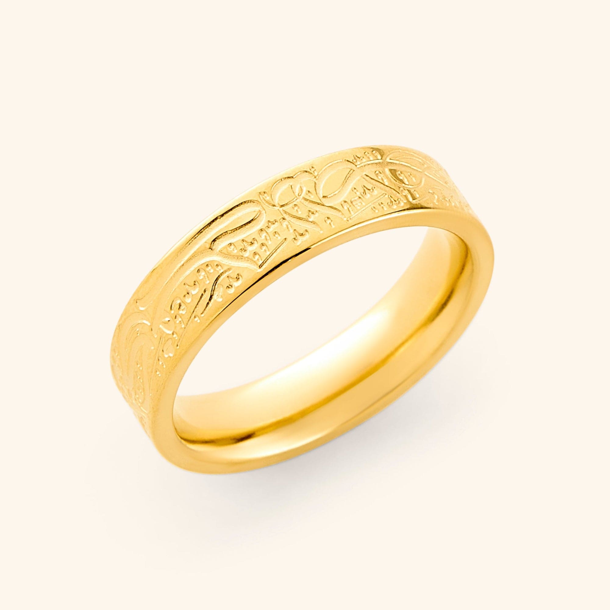 Rumi ring with gold plating displayed in velvet pouch