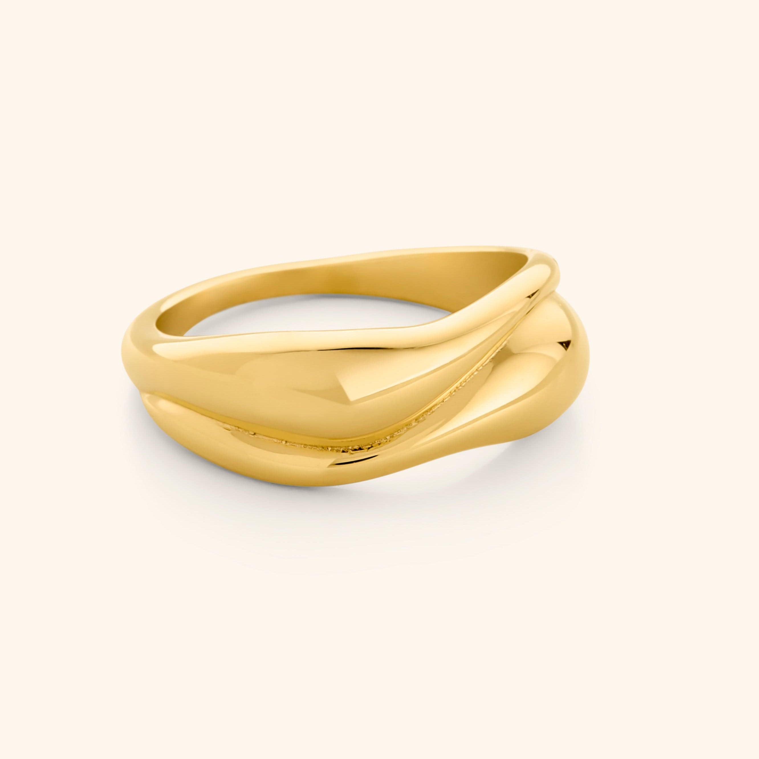 Fluid Harmony Stackable Ring displayed elegantly on a finger, showcasing its dainty design.