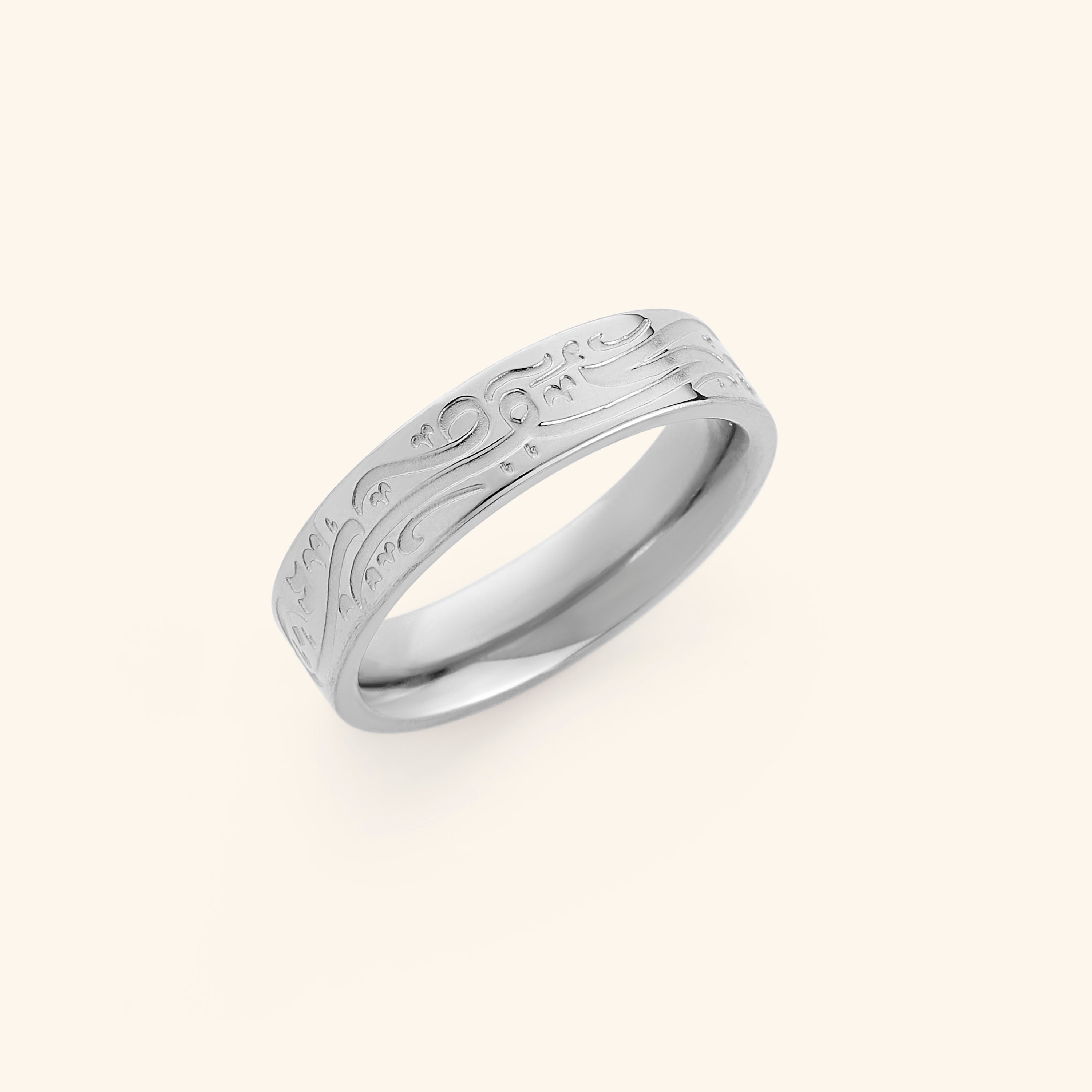 Lifestyle image of a woman wearing the engraved ring, symbolizing faith and divine connection.