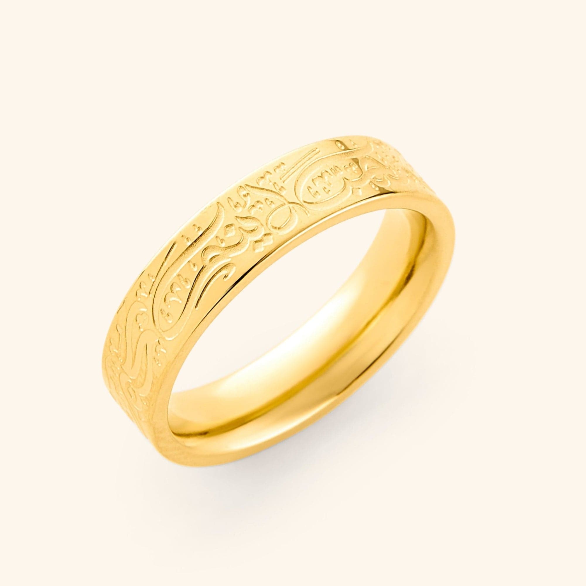 Close-up of the Rumi love quote ring on a hand, showcasing its elegant design.