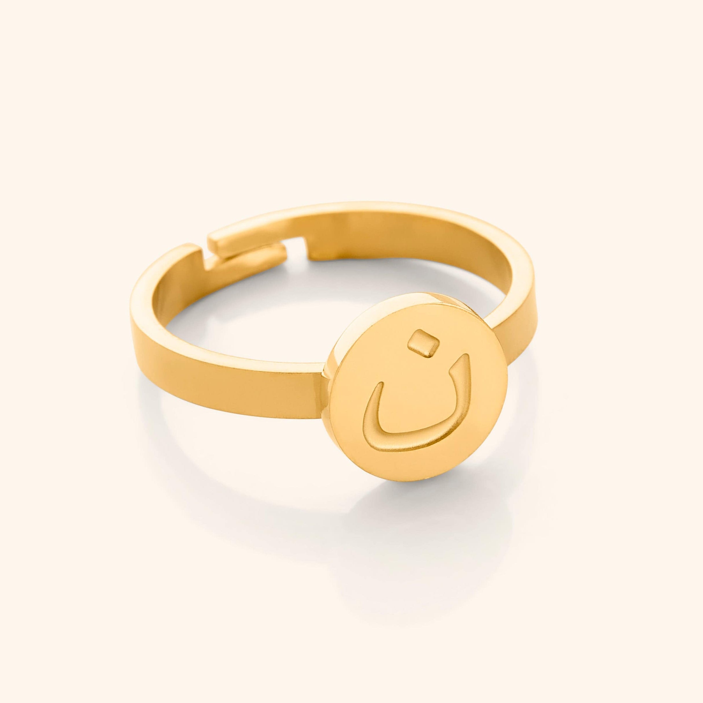 Elegant custom name letter ring showcasing the gold plated finish.