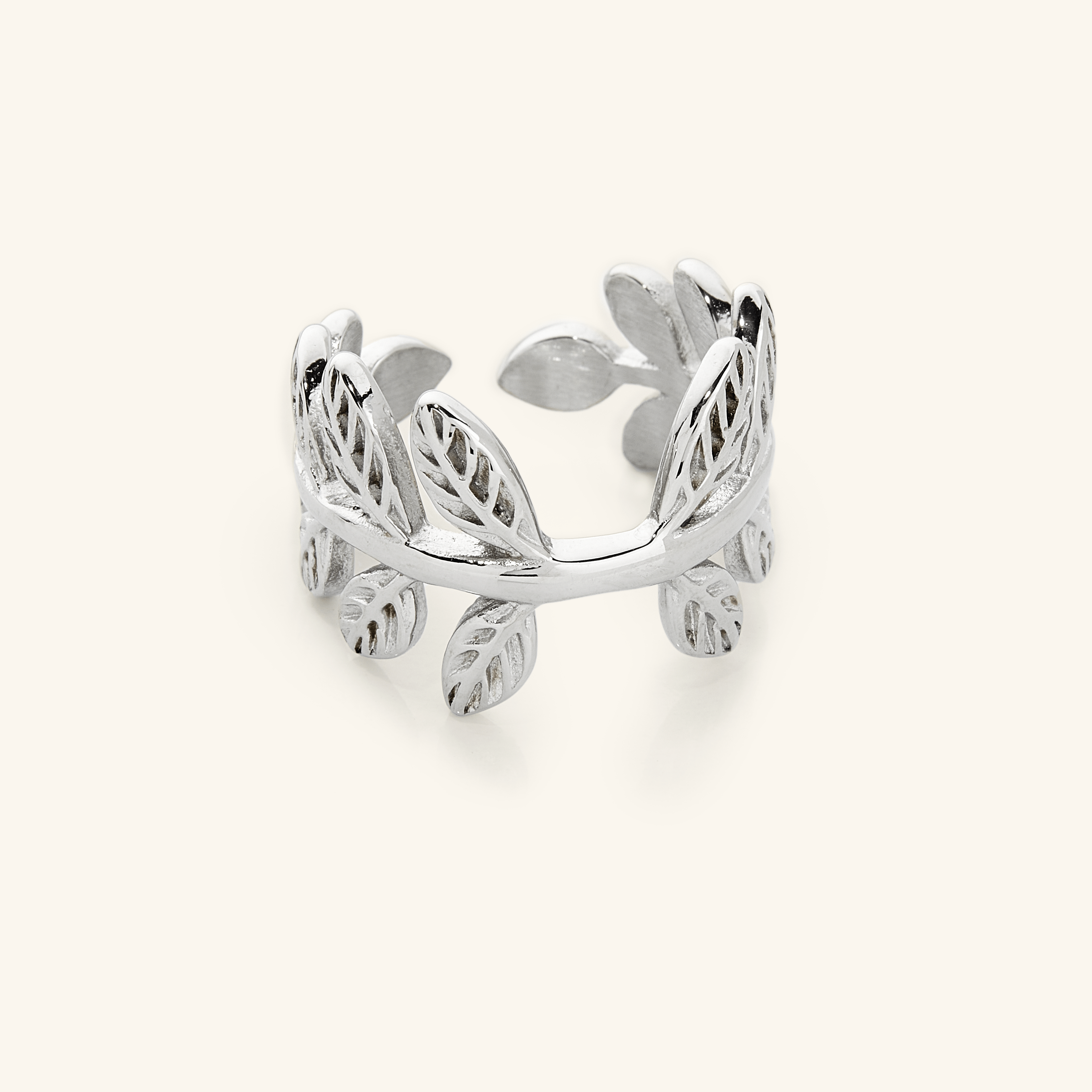 Close-up of the gold plated olive branch ring, emphasizing its detailed craftsmanship.