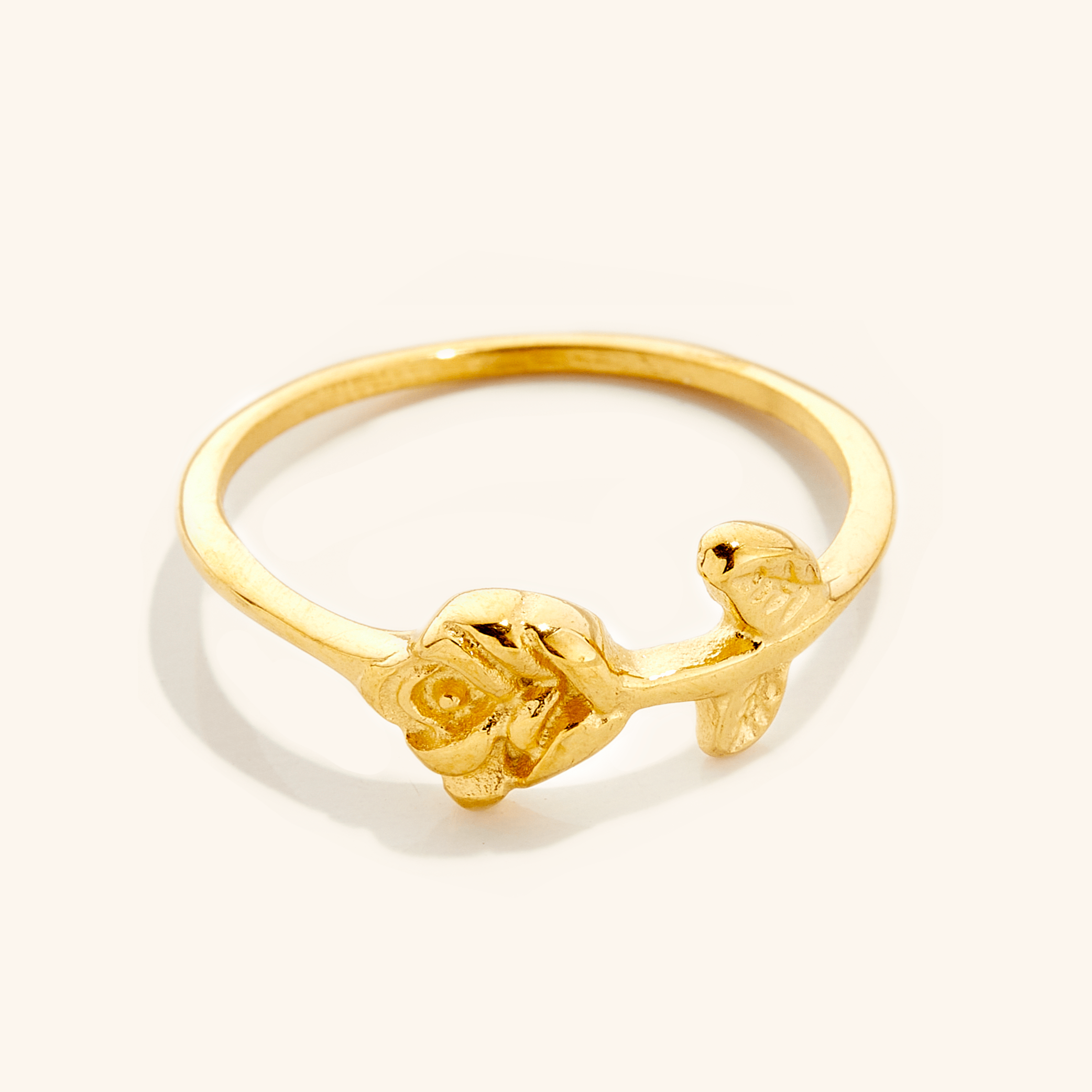 Close-up view of the Enchanted Rose Minimalist Ring showcasing its delicate design and gold finish.