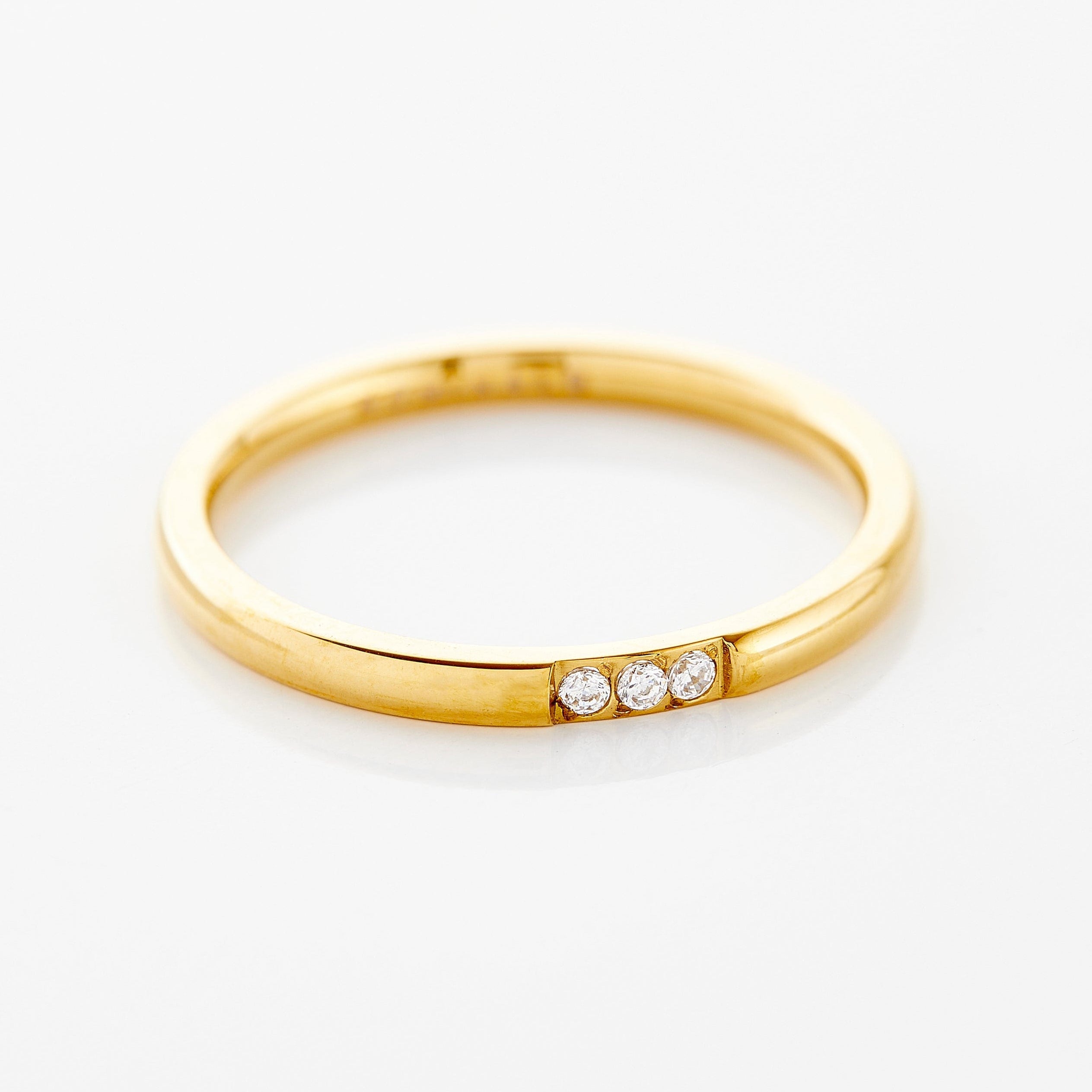 Luxe Triple Bezel Ring showing three sparkling gems from the top view.