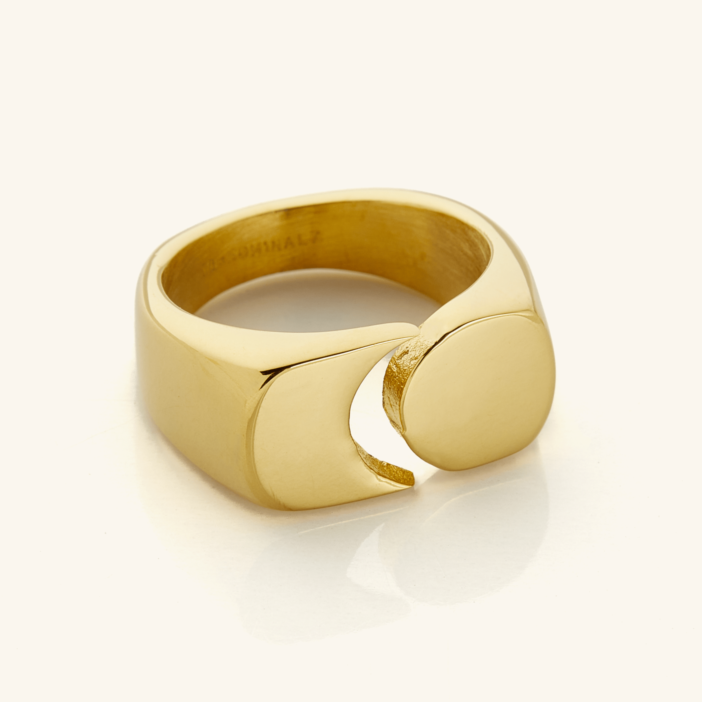 Front view of chunky gold ring showcasing bold moon-inspired split design