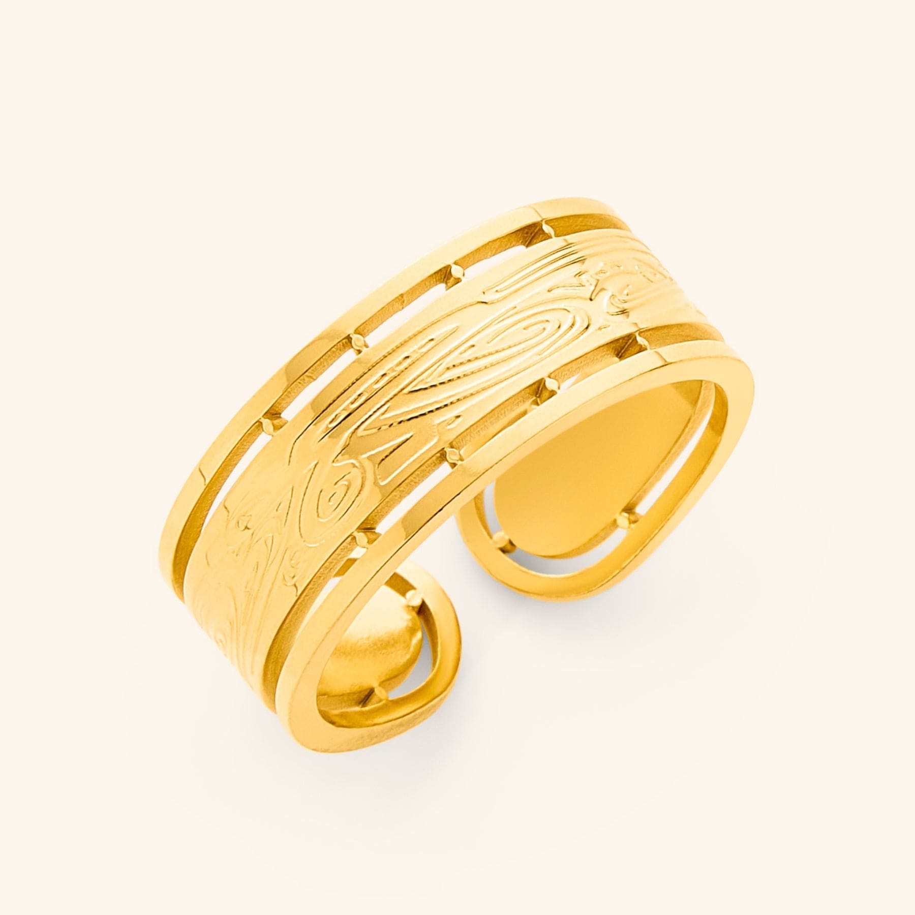 Close-up of the SABIREEN ring showcasing the intricate calligraphy and gold plating.