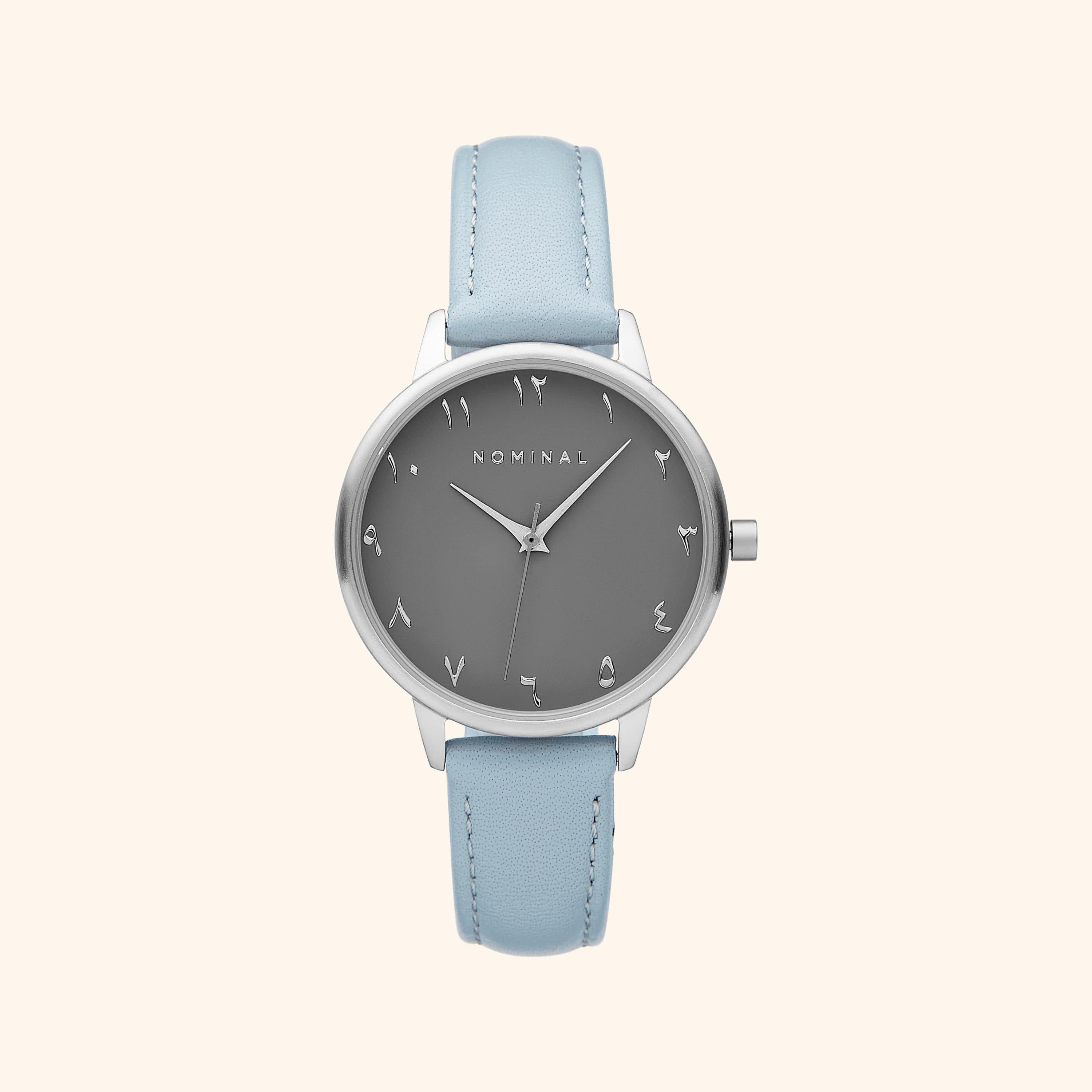 Side view of the Mist grey dial leather watch highlighting its sleek design.