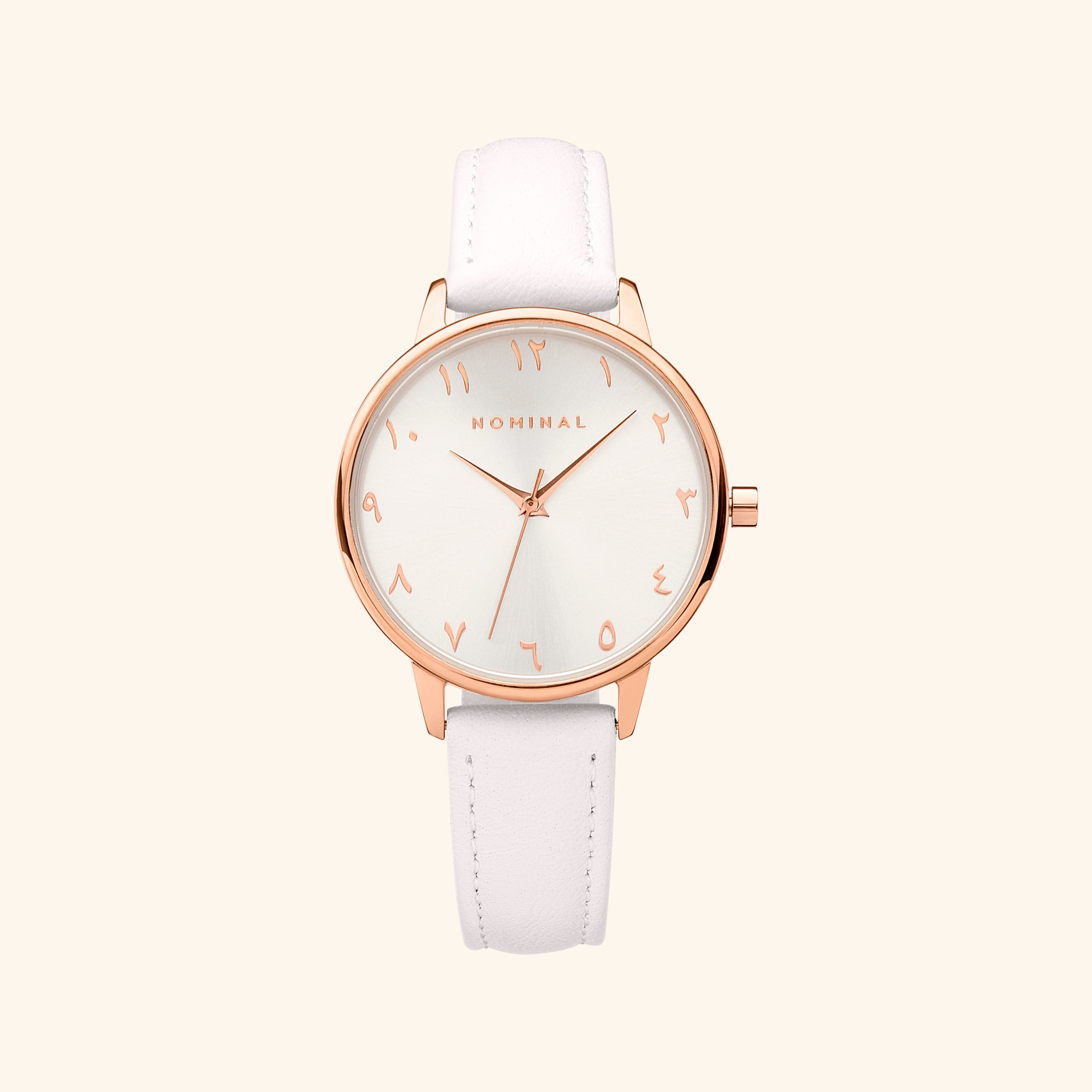 Close-up of the Purity Elegance wristwatch featuring a sleek white and silver design with rose gold accents.