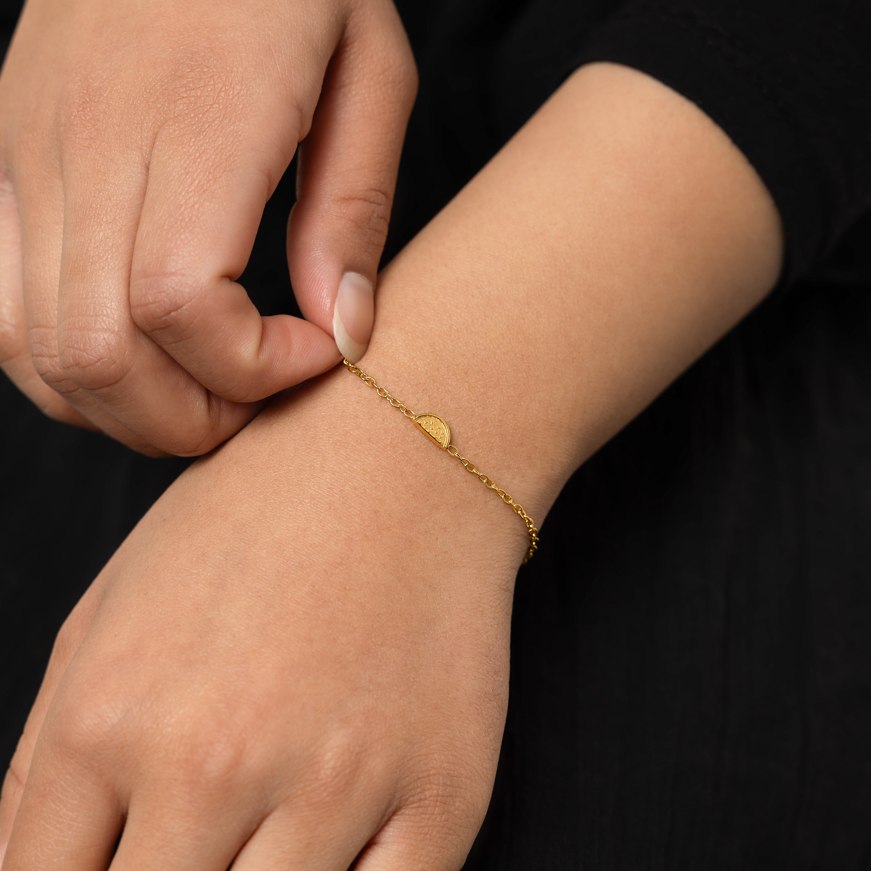 Close-up of the Heritage Watermelon Bracelet highlighting its delicate gold plating.