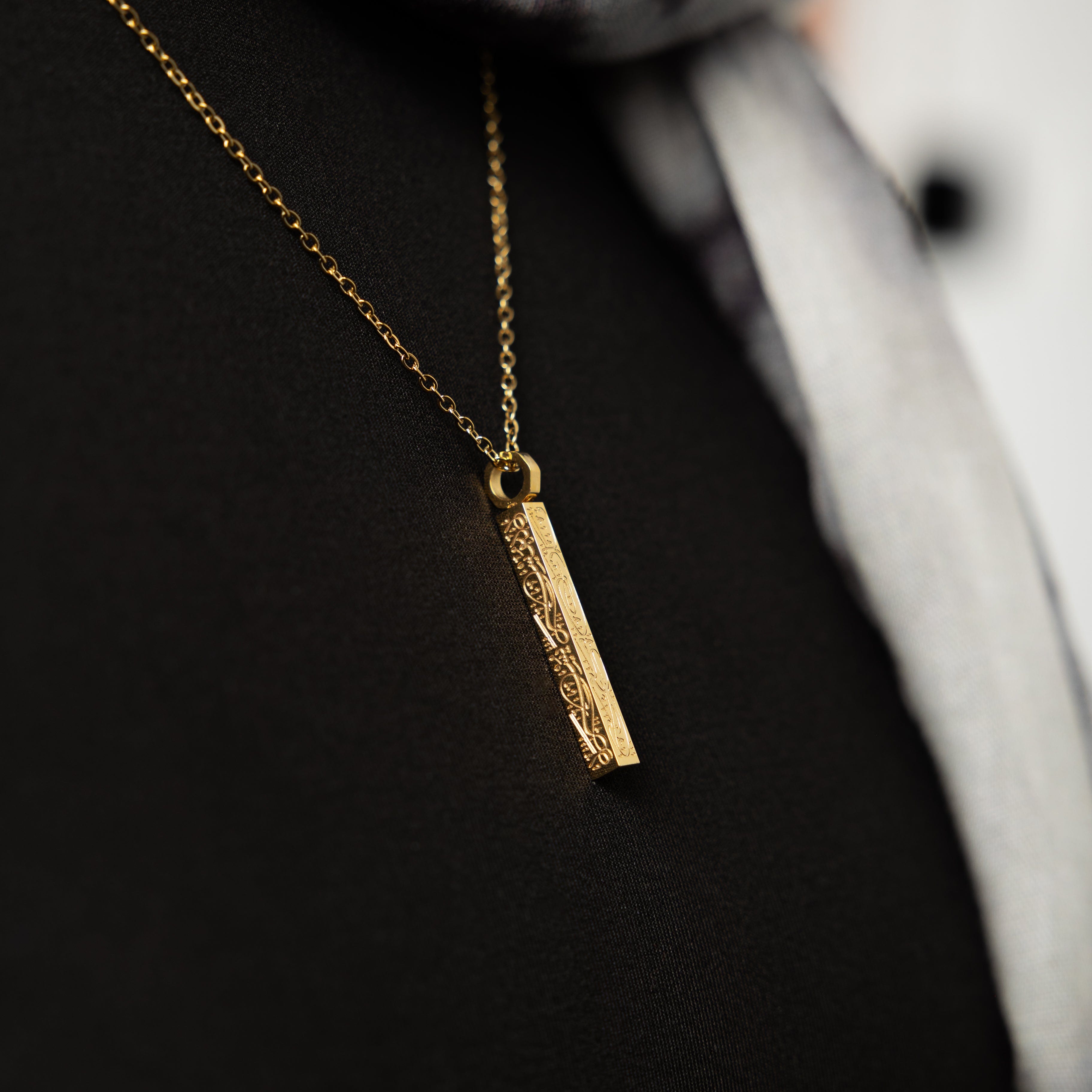 Model wearing the Resilient Spirit Bar Necklace at its full length of 22 inches, highlighting its elegance.