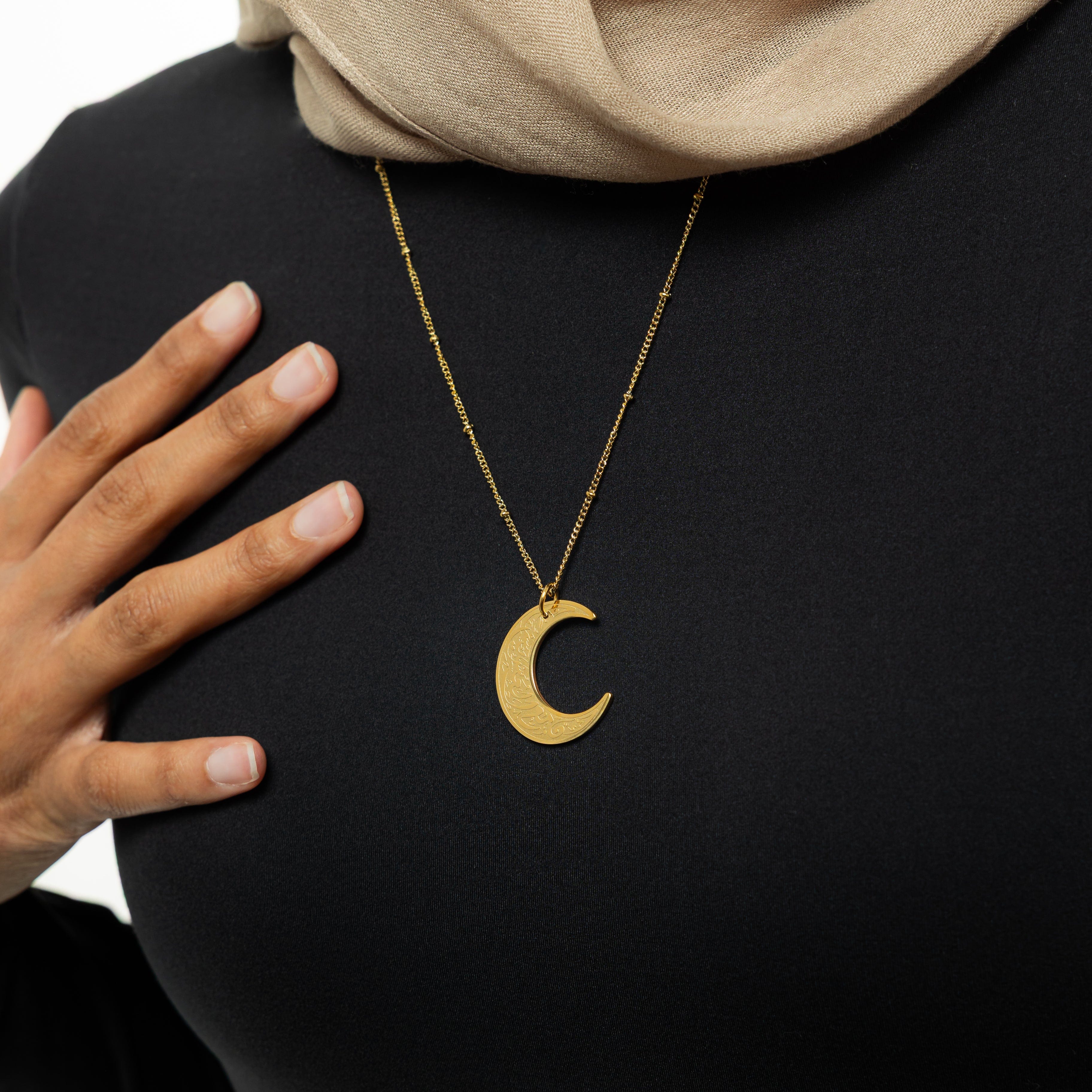 Crescent of Resilience Necklace displayed in a velvet pouch, emphasizing its thoughtful packaging.