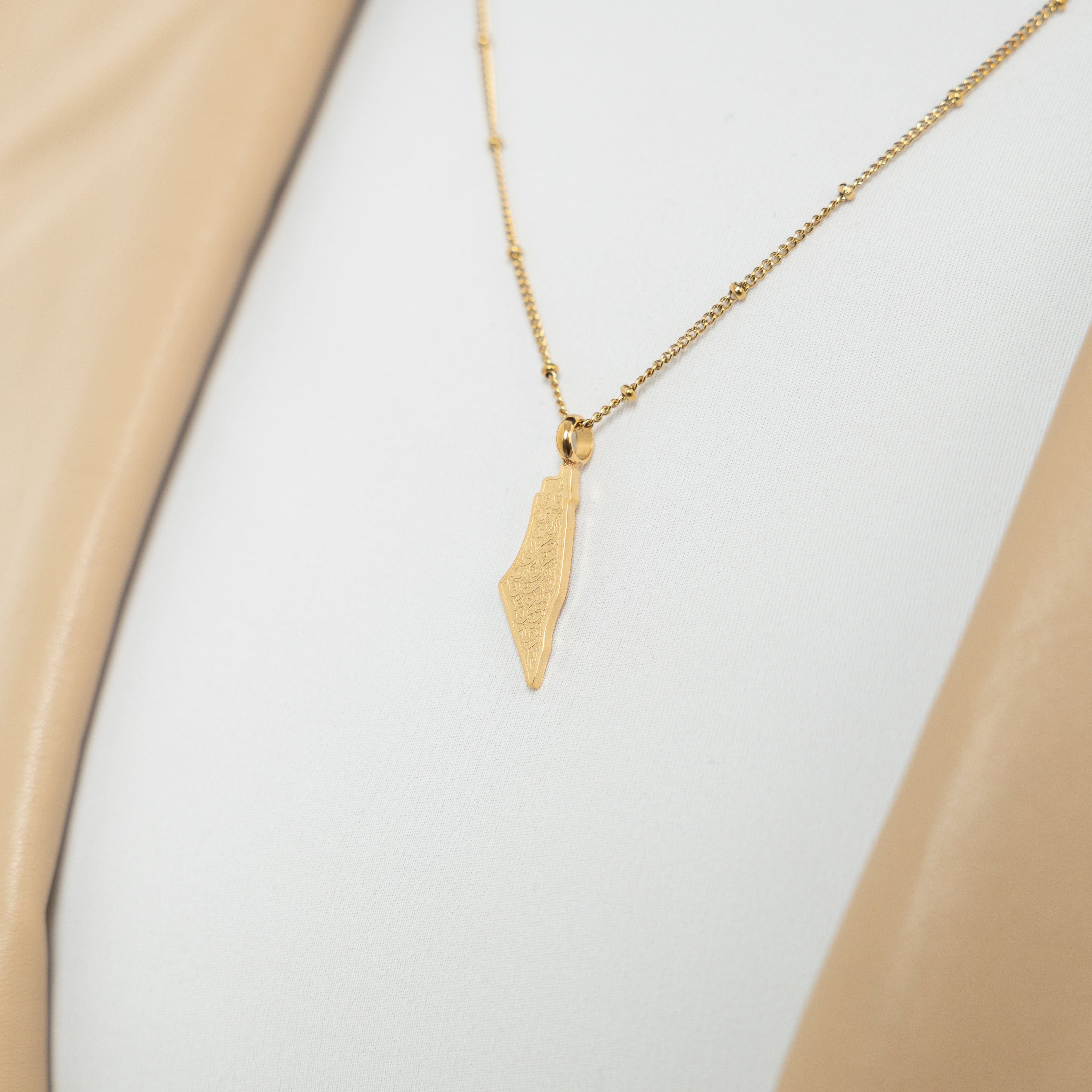 Model wearing Resilient Journey necklace, highlighting its comfort and elegance