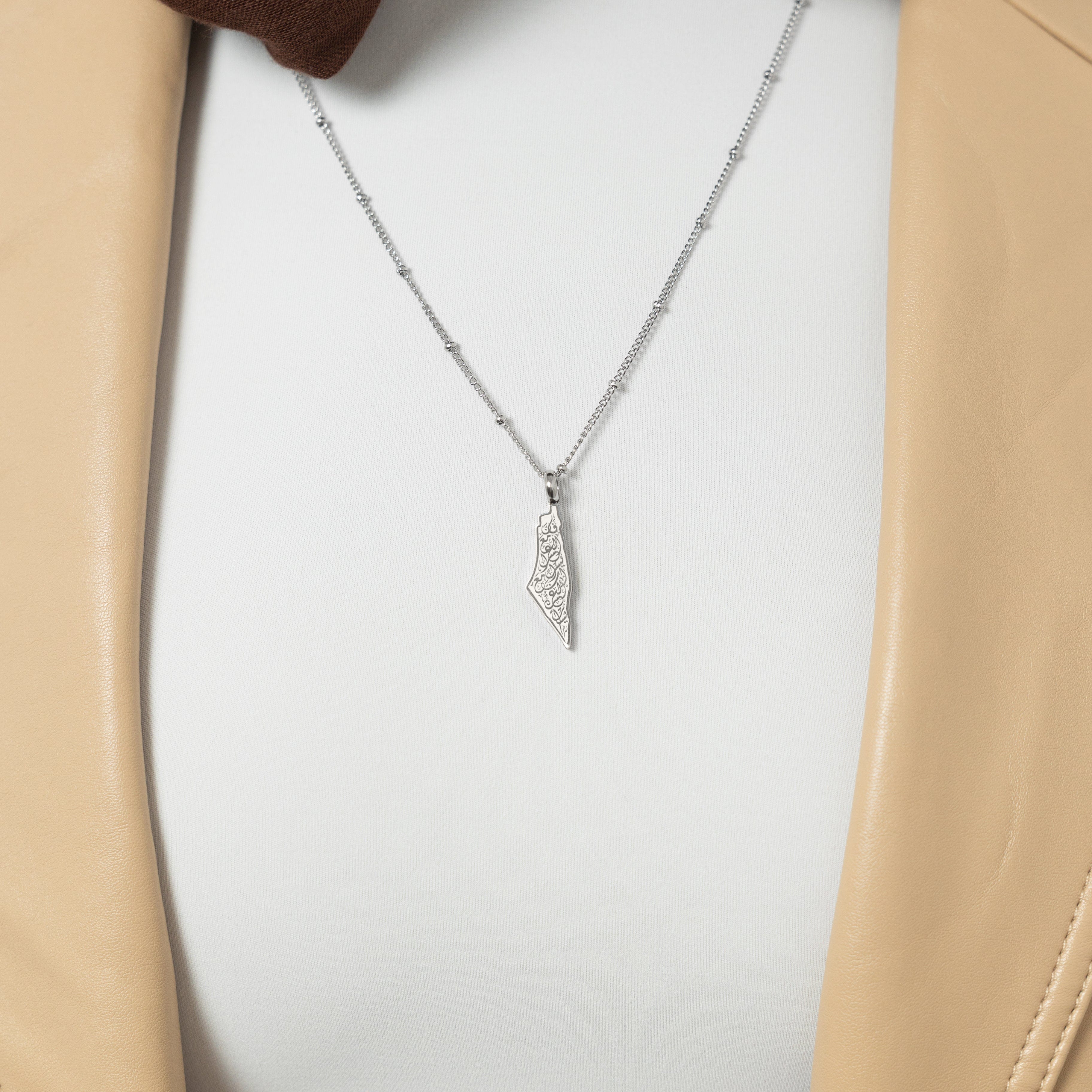 Model wearing Resilient Journey necklace, highlighting its comfort and elegance