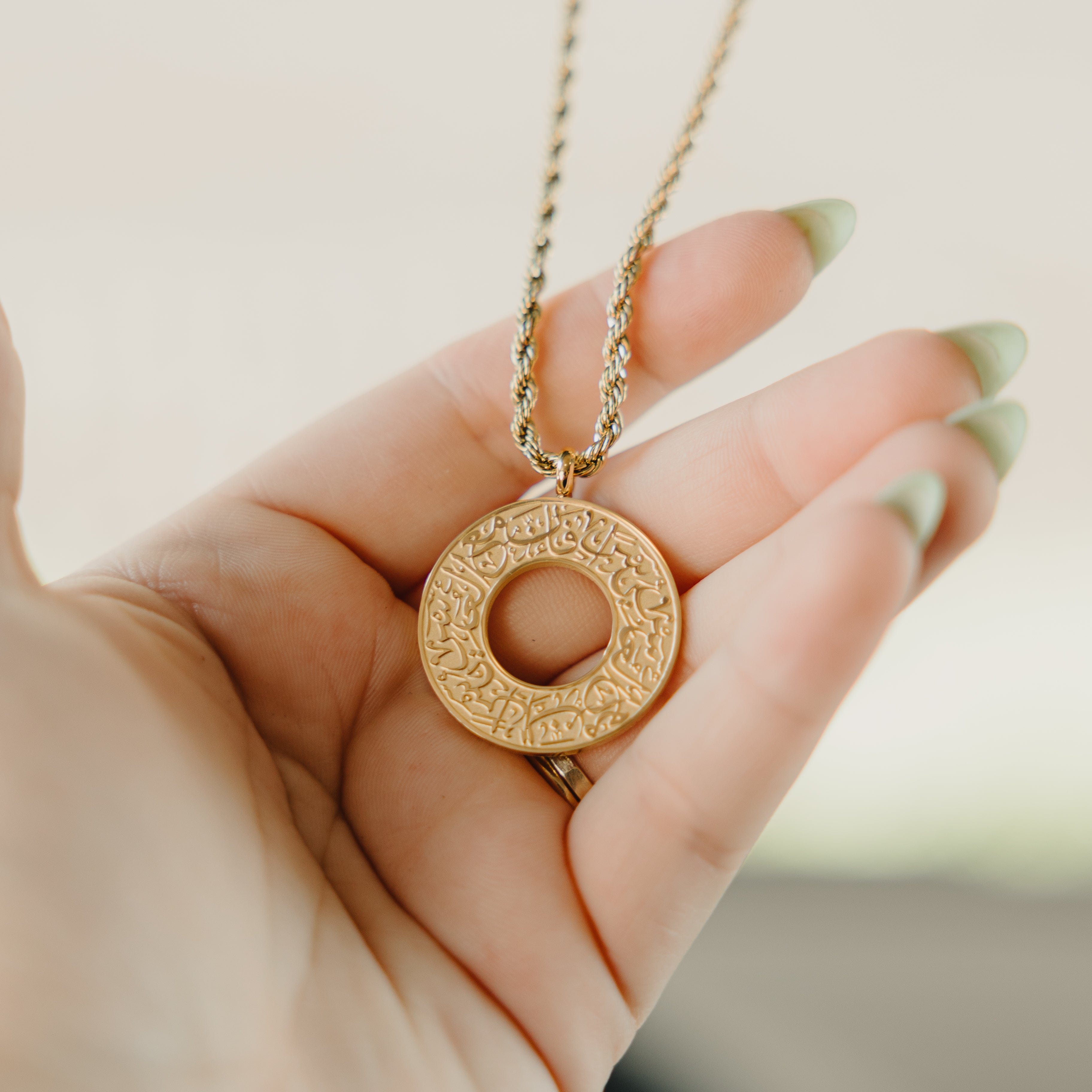 Stylish car hanger in a velvet pouch, ideal for gifting or personal use with a motivational flair.