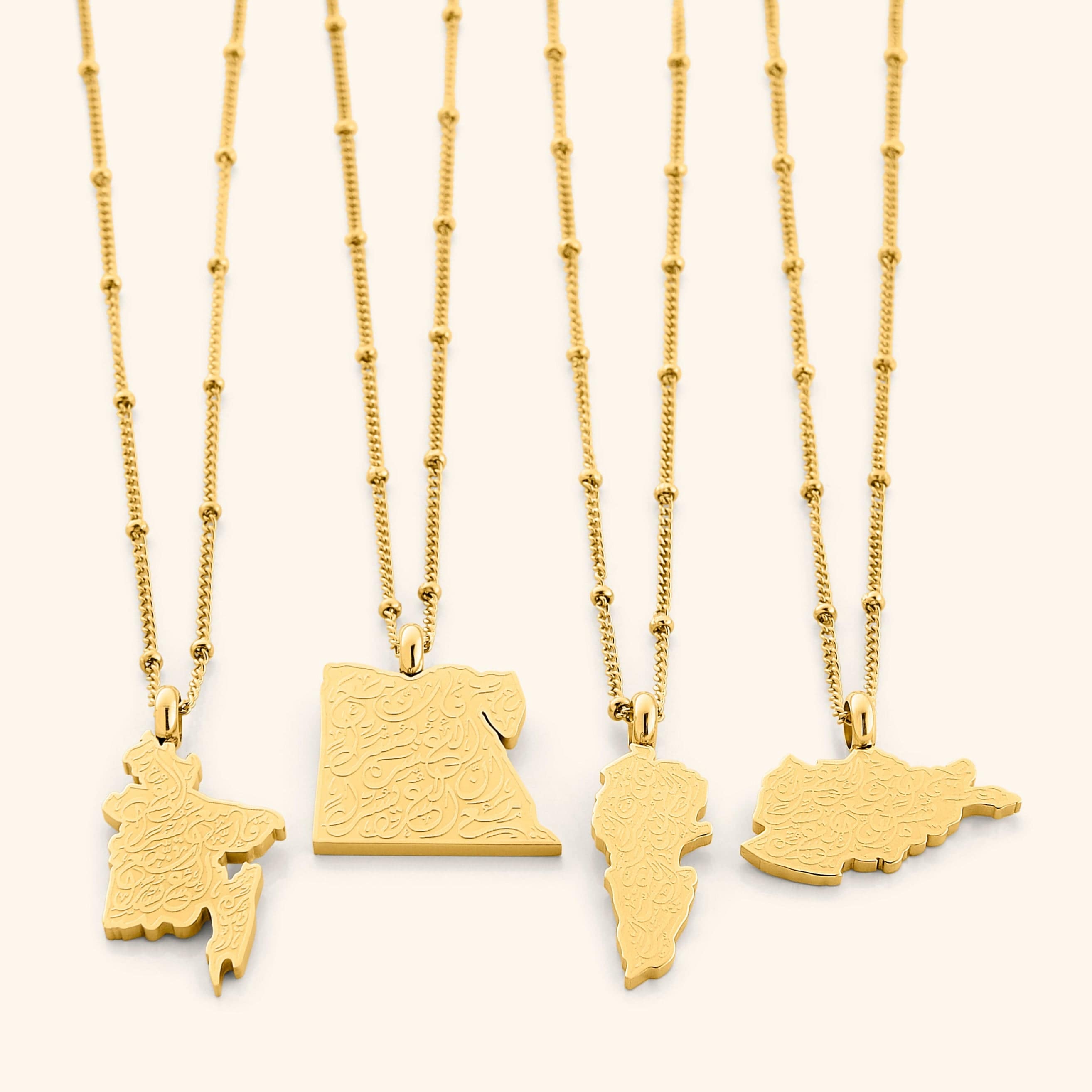 Detailed view of the pendant and chain showcasing 18K gold plating