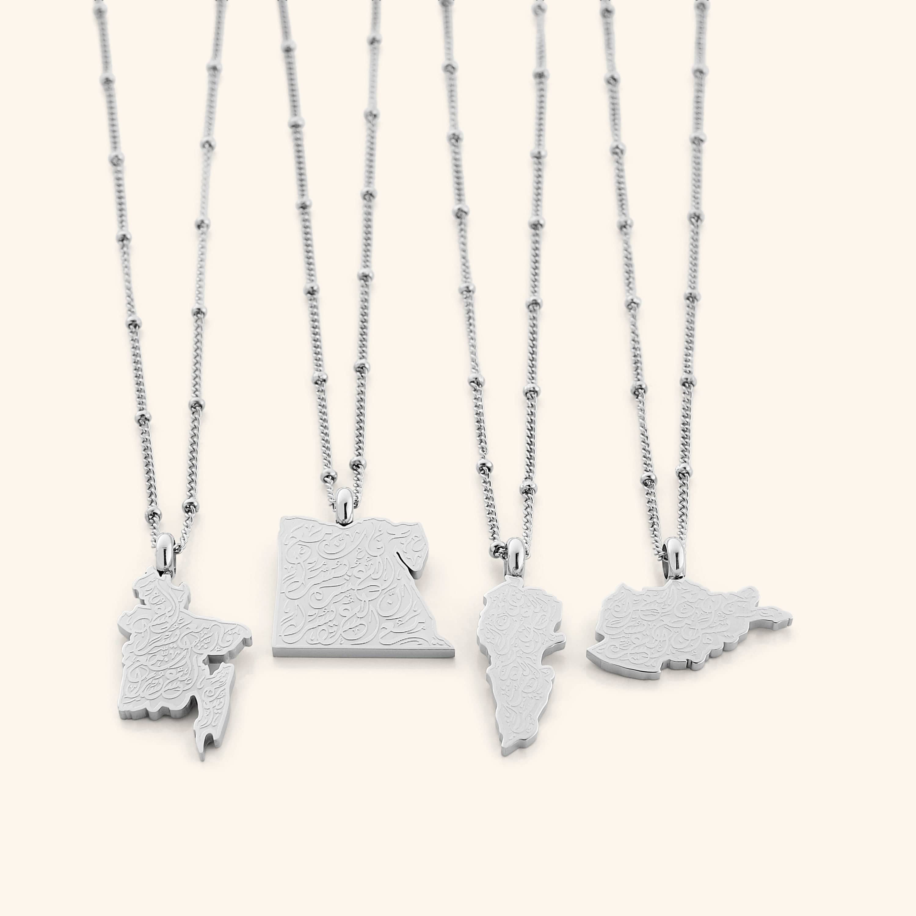 Detailed view of the pendant and chain showcasing 18K gold plating
