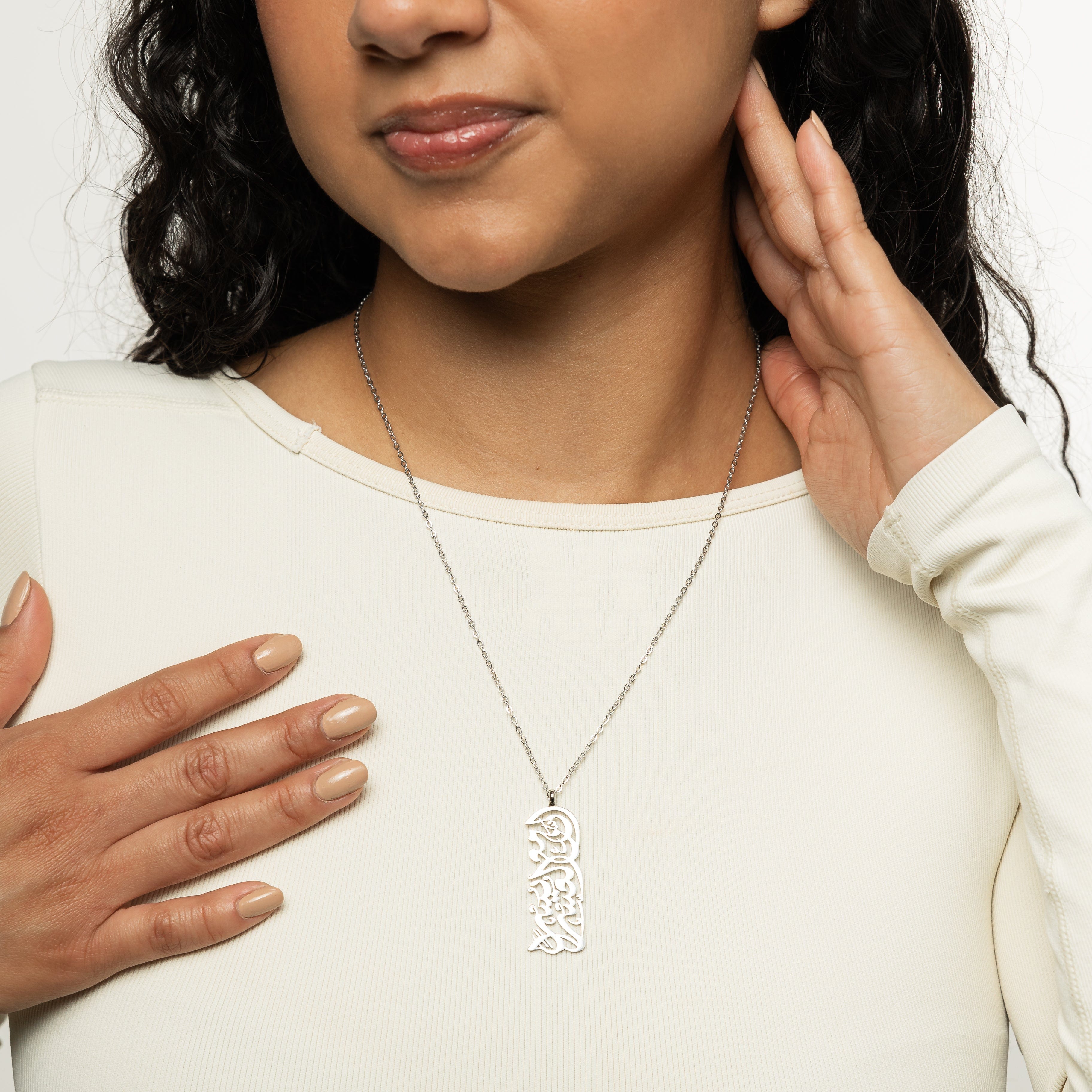 The necklace displayed in a velvet pouch, perfect for gifting, emphasizing its unique design.
