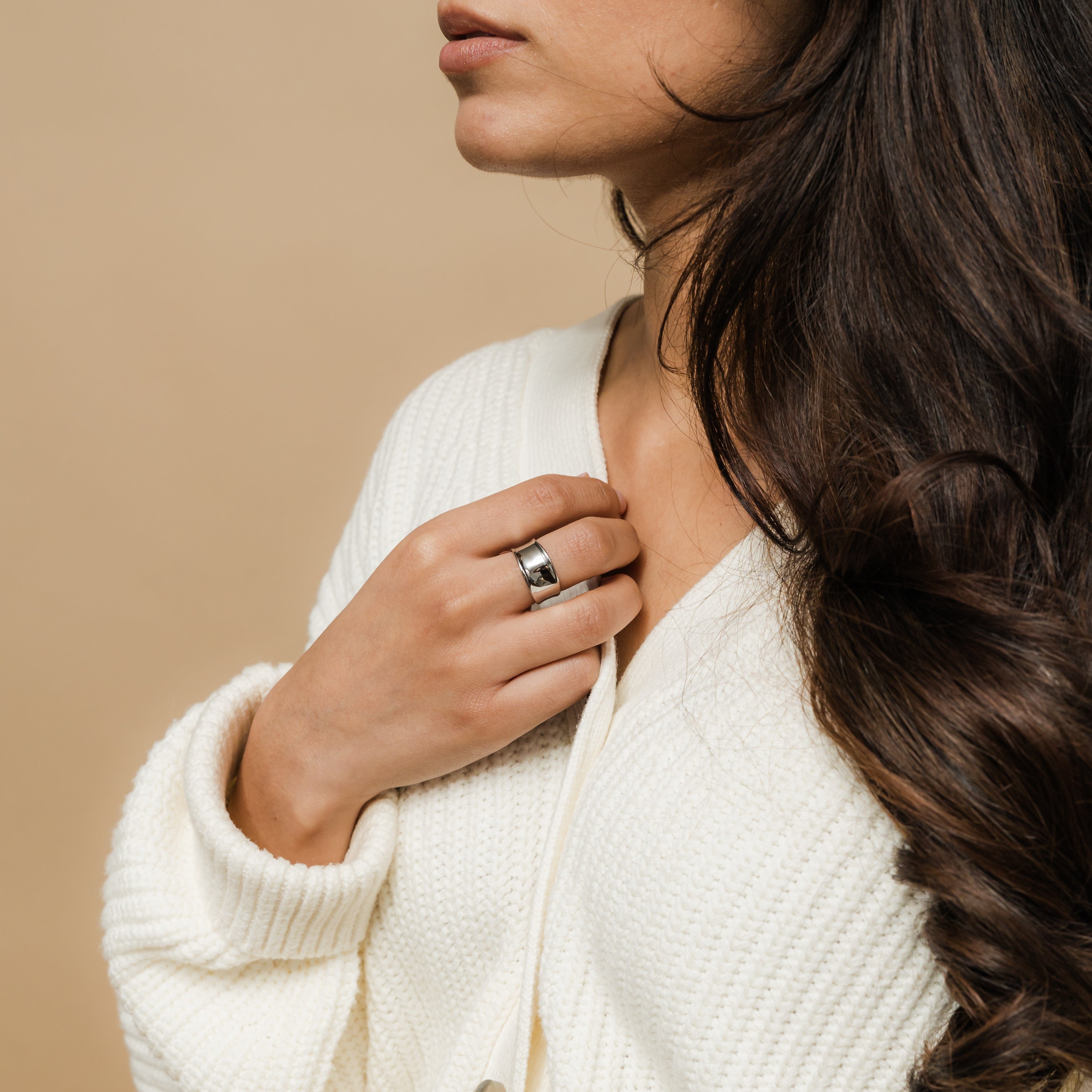 Elegant setup of the Melted Elegance Chunky Ring in a velvet pouch, highlighting the luxurious finish.
