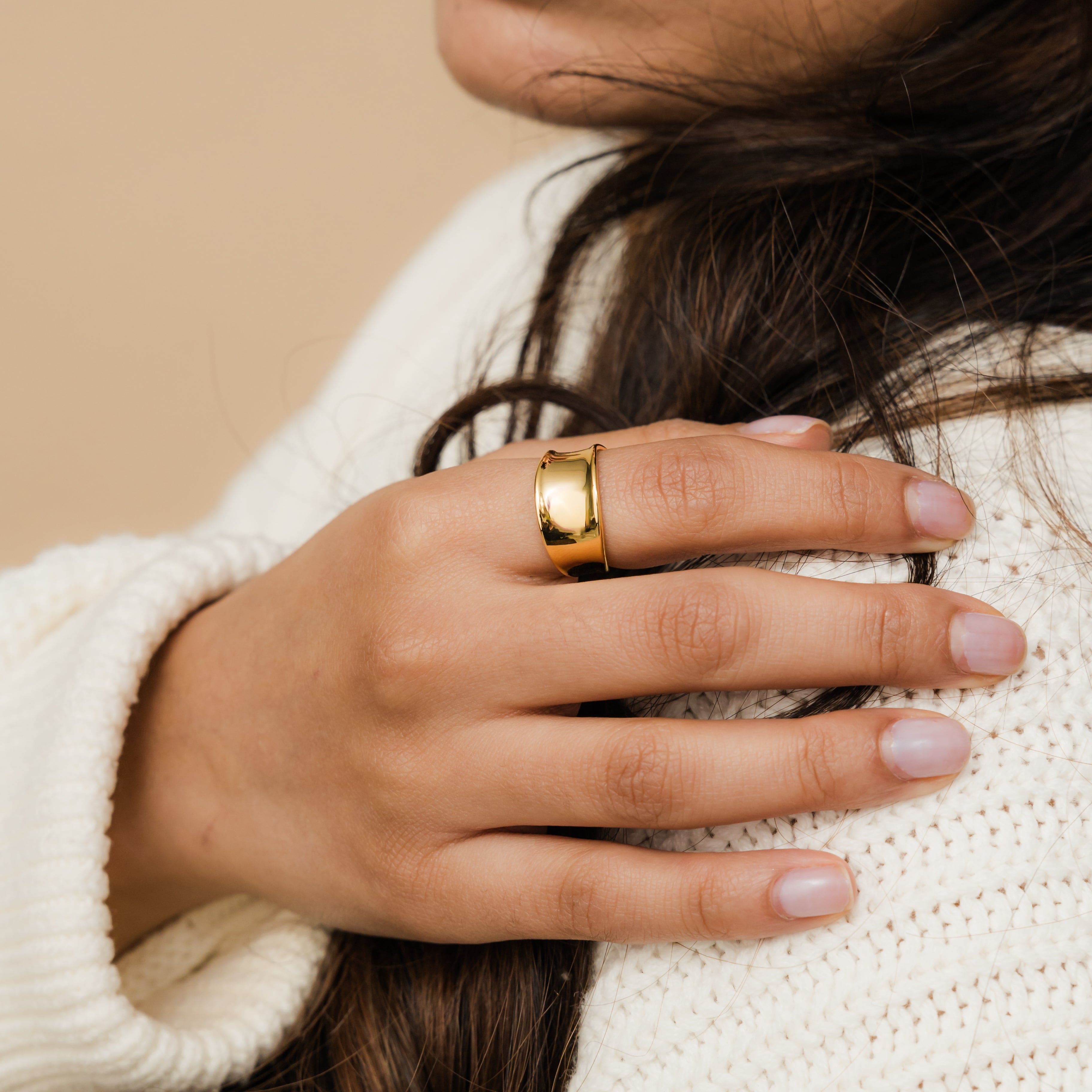 Elegant setup of the Melted Elegance Chunky Ring in a velvet pouch, highlighting the luxurious finish.
