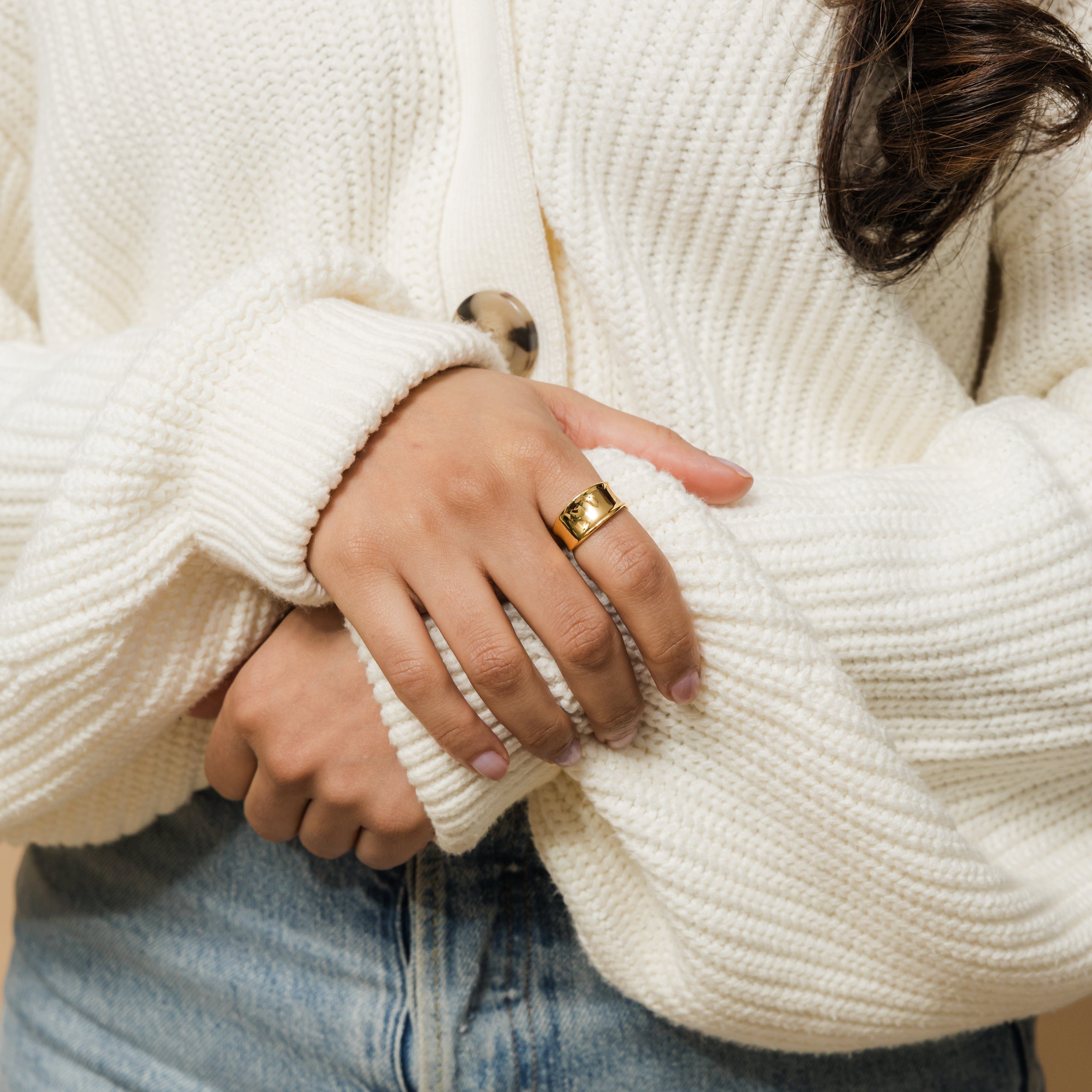 Melted Elegance Chunky Ring showcasing the unique flow and tall band from a side angle.