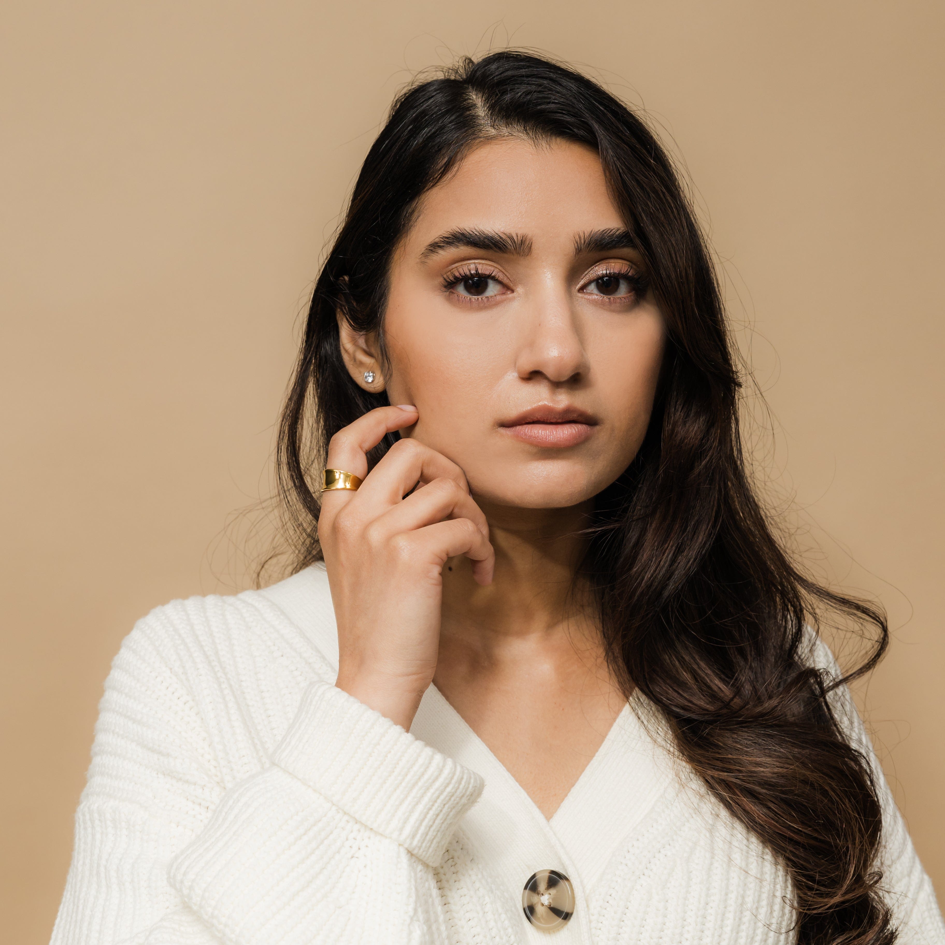 Elegant setup of the Melted Elegance Chunky Ring in a velvet pouch, highlighting the luxurious finish.