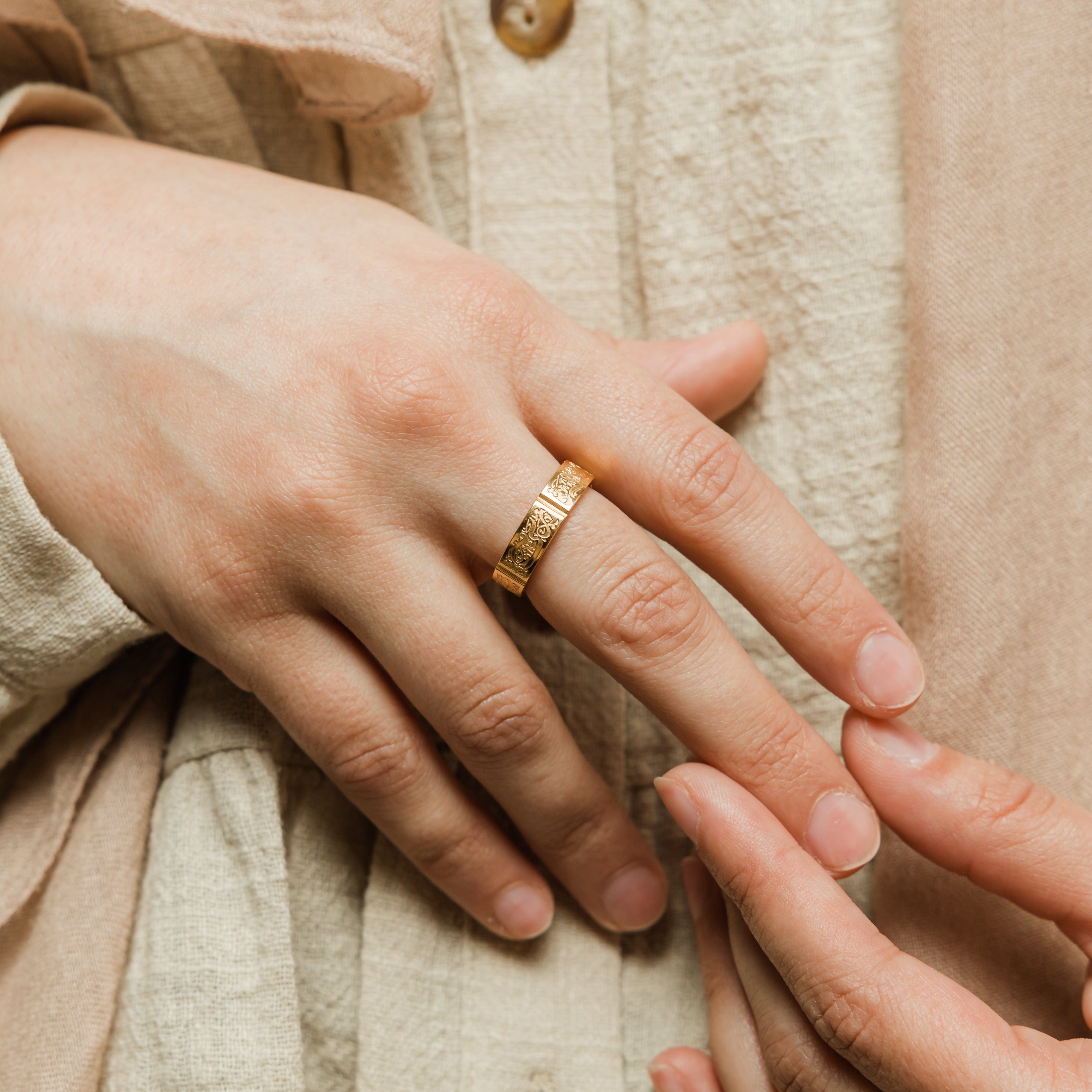 Five Pillars Ring displayed on a hand, symbolizing faith and spirituality.