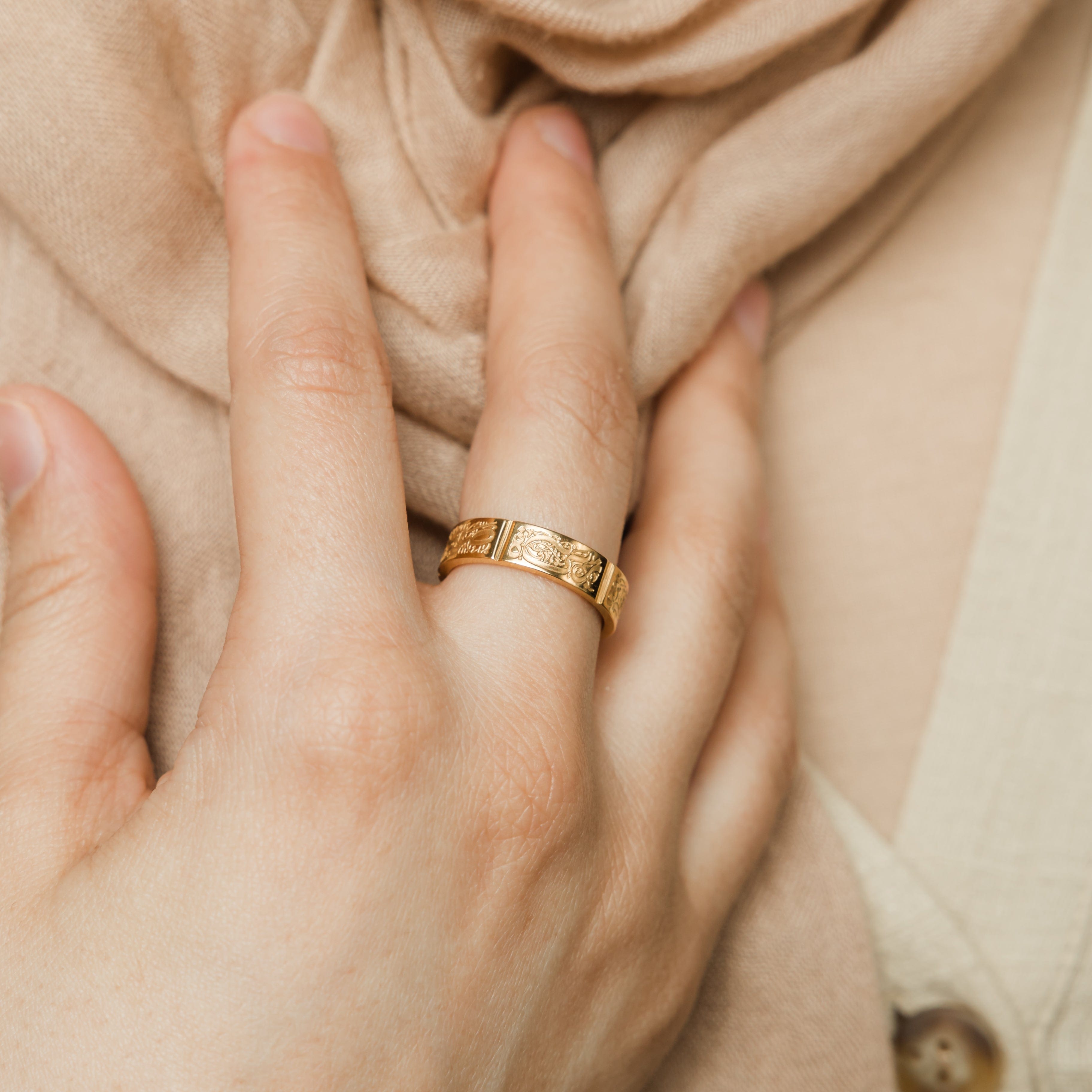 Five Pillars Ring displayed on a hand, symbolizing faith and spirituality.