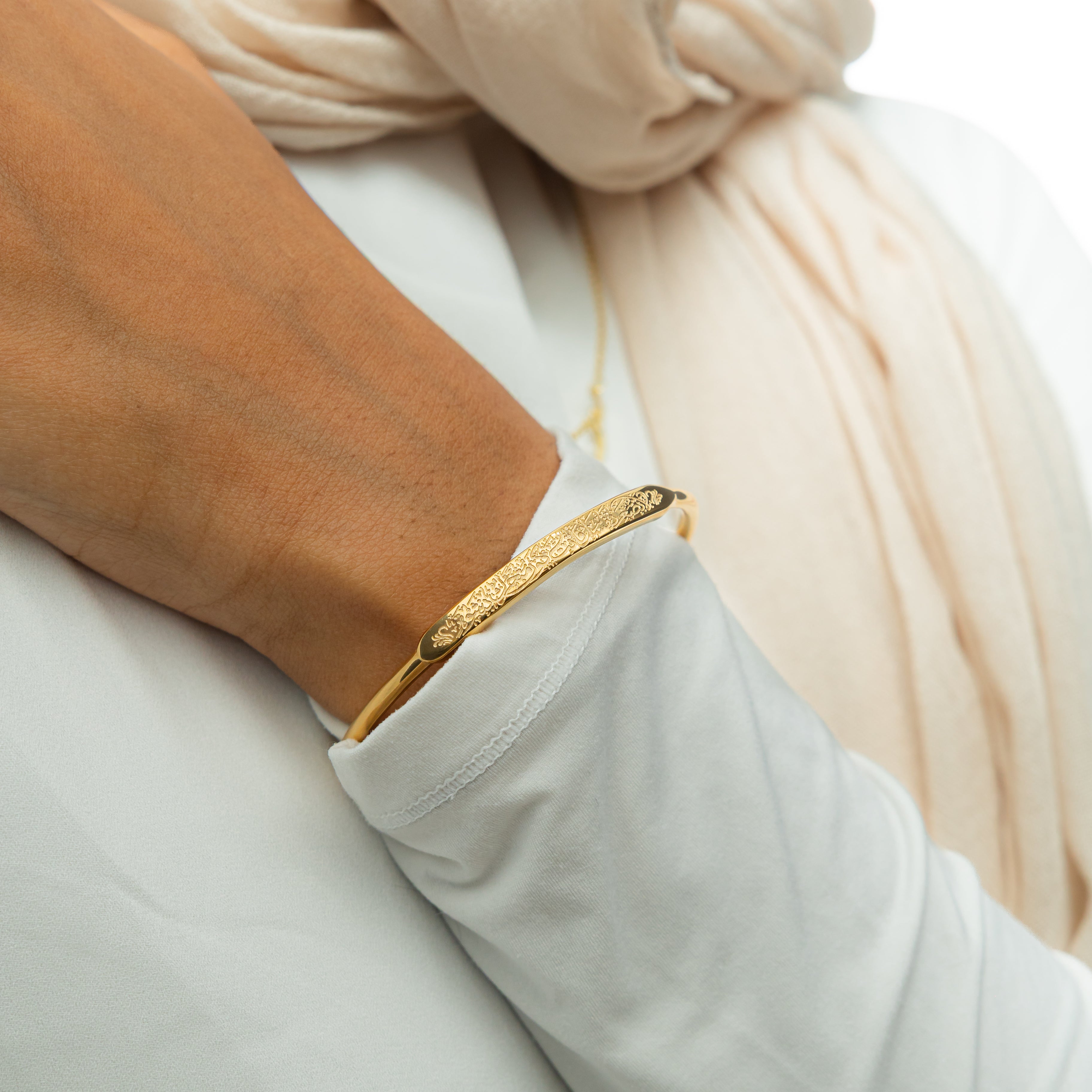 Rumi motivational bracelet worn on a wrist, showcasing its elegant style.