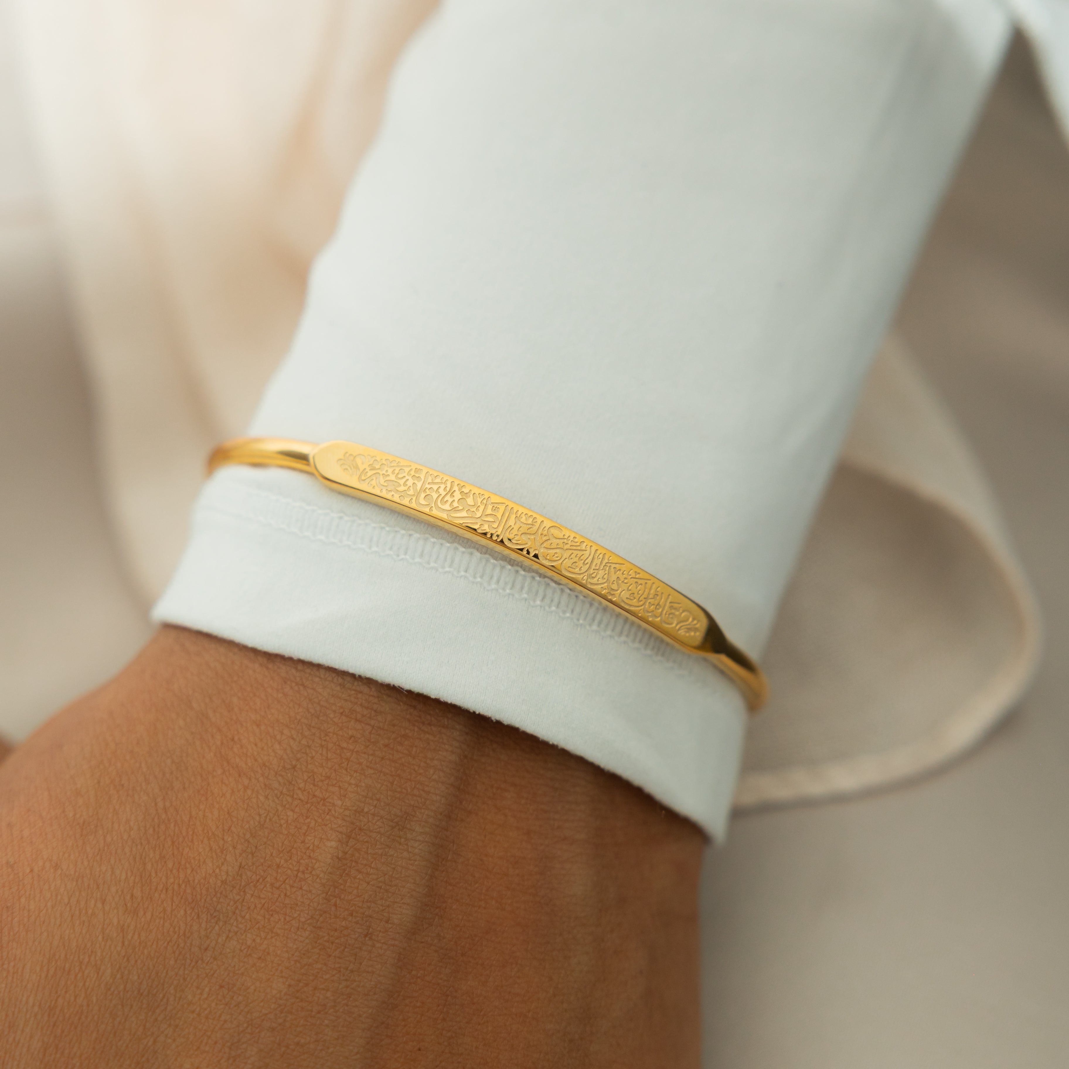 Close-up of Rumi bangle highlighting the 18k gold plating and elegant craftsmanship.