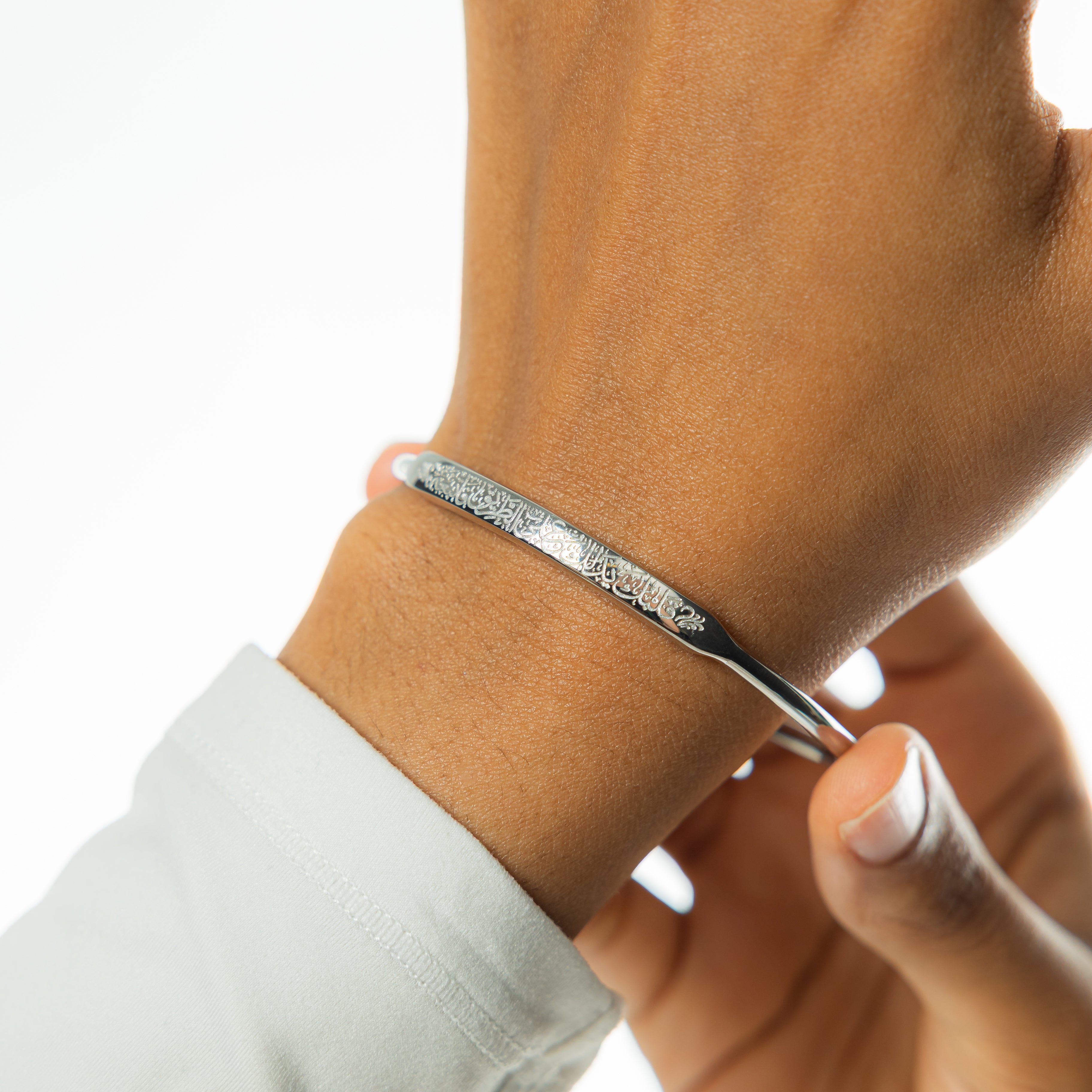 Close-up of Rumi bangle highlighting the 18k gold plating and elegant craftsmanship.