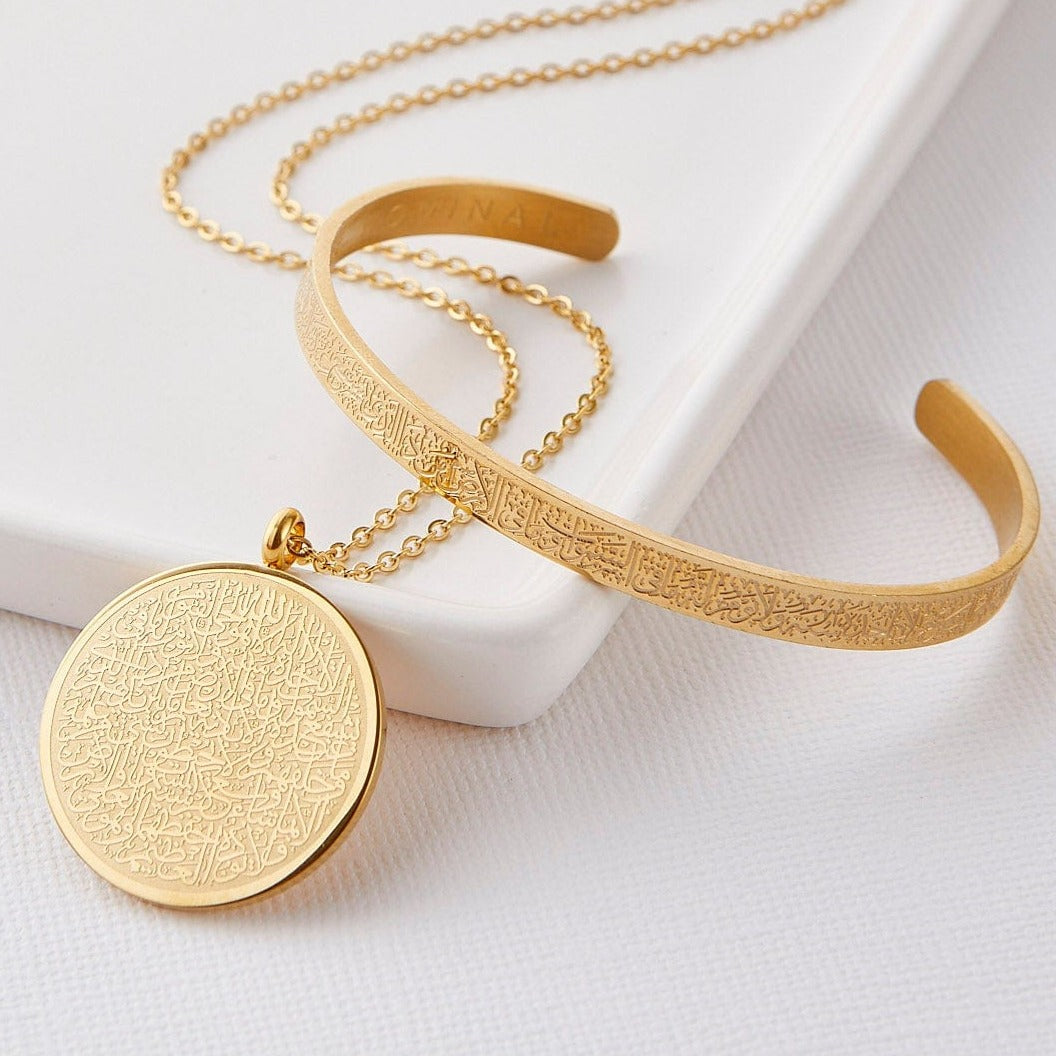 Ayatul Kursi necklace featuring intricate Arabic designs, displayed elegantly.