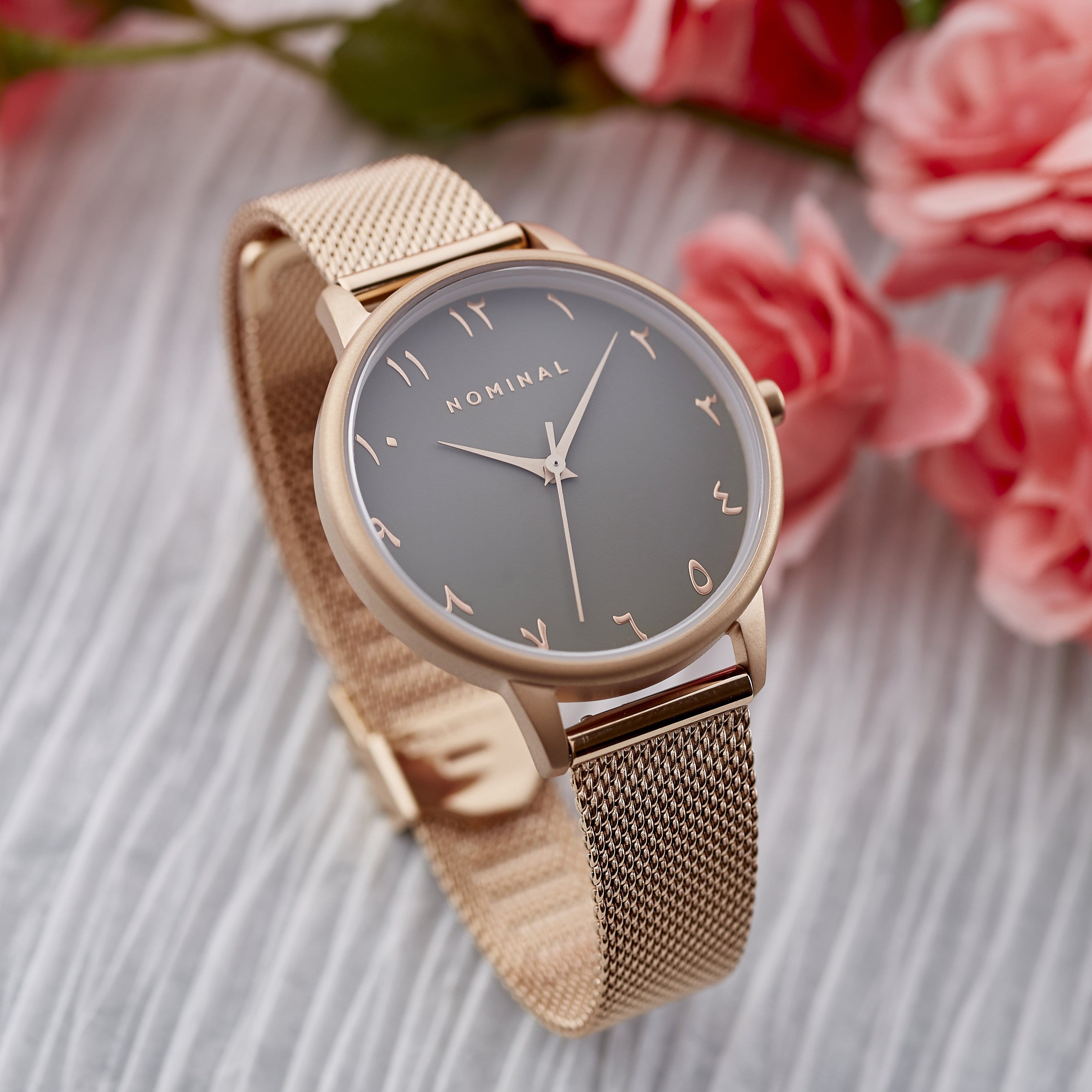 Autumn Elegance Watch close-up showing the Arabic numeral design on the grey dial.