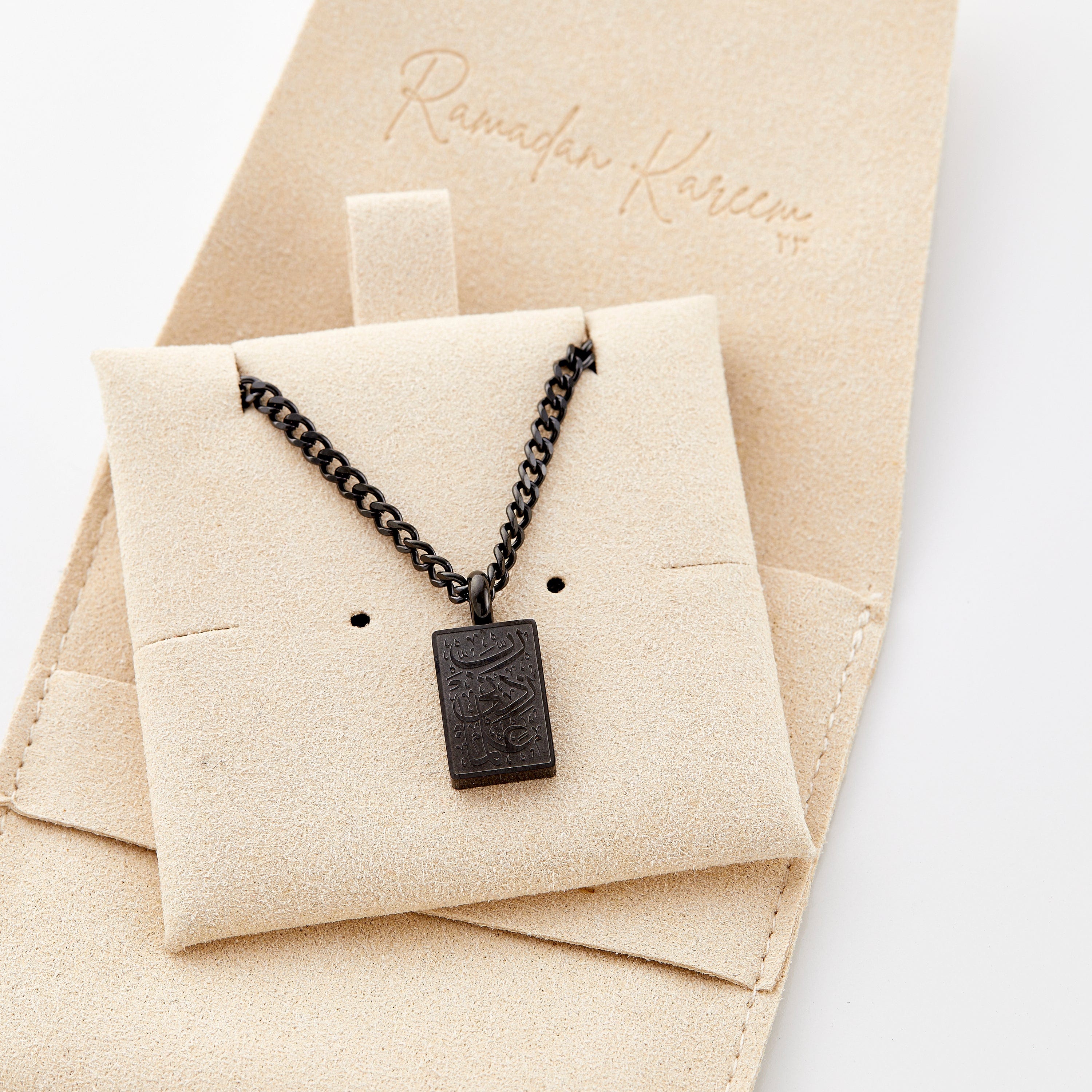 Close-up of the Knowledge Embrace Necklace highlighting the intricate details.