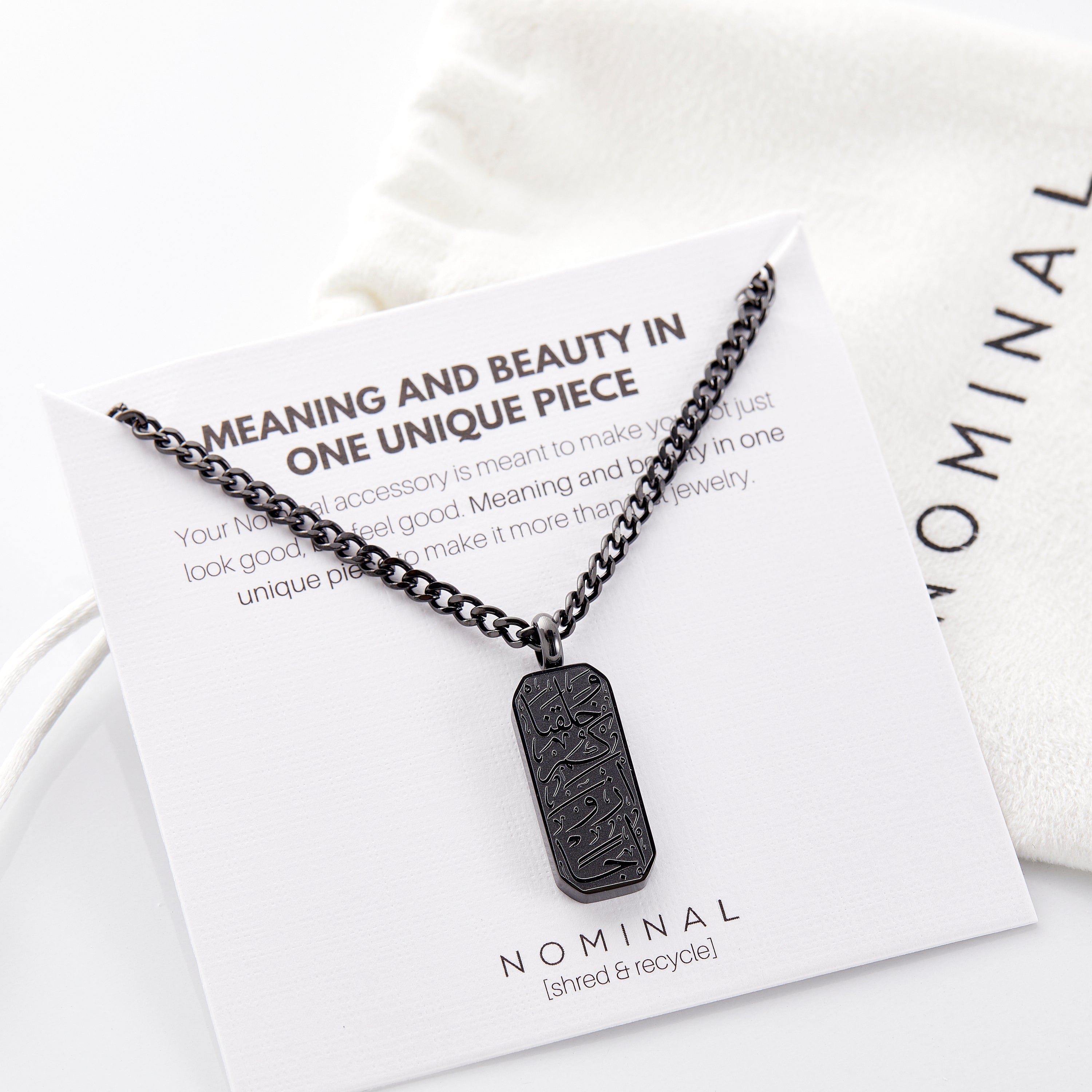 Elegant packaging of the Pairs of Love necklace in a Nominal pouch, perfect for gifting.