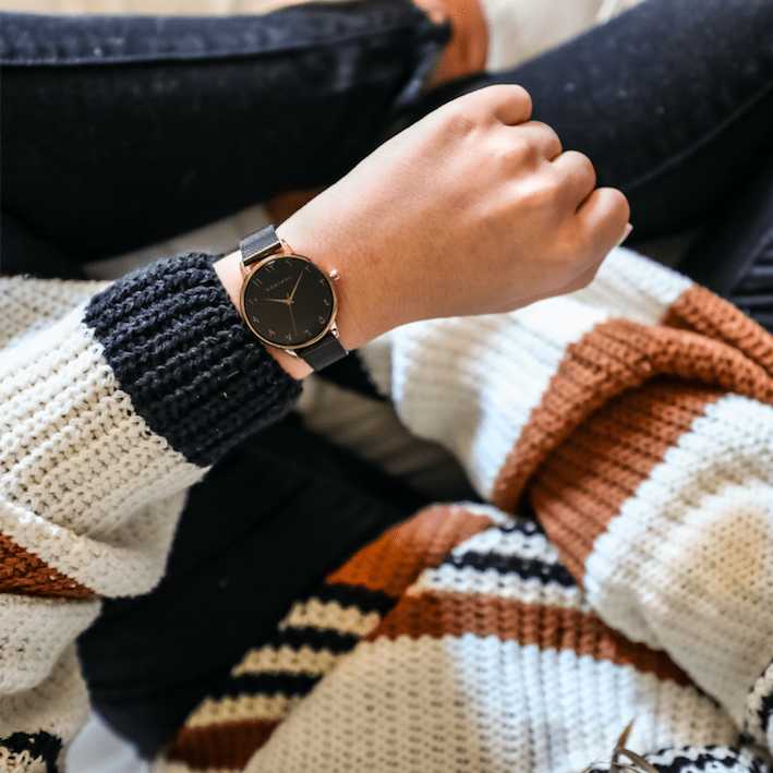 Side view of Dusk Elegance watch highlighting the sleek stainless steel strap.
