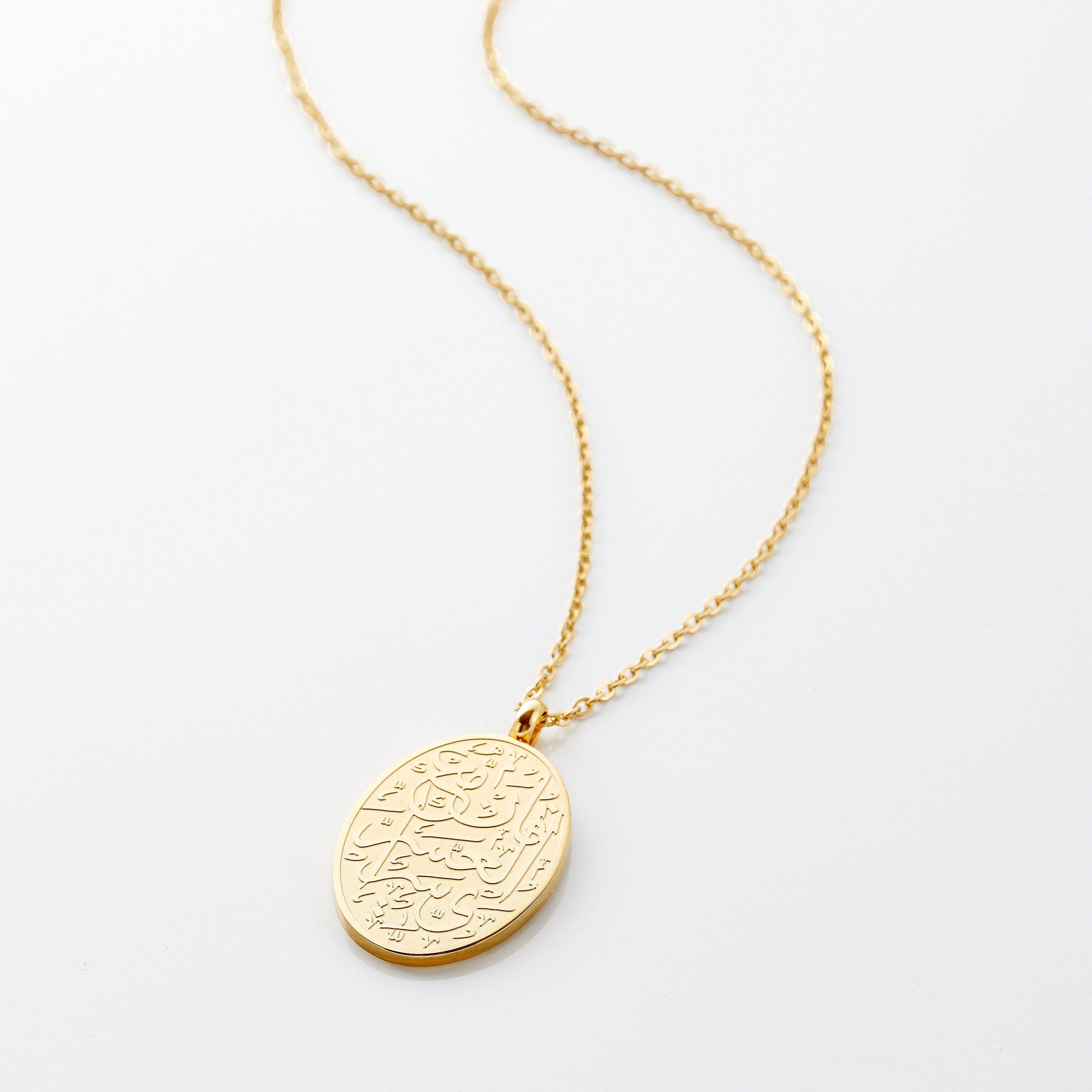 Inspiration Oval Pendant Necklace displayed on a model, showcasing its elegant design and 22-inch adjustable chain.
